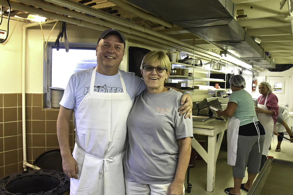 Elmer Wengert, a skilled candy maker who has worked at Rheb’s for 38 years (l), Pat Harger (r), and many long-time employees keep Rheb Candies the go-to Baltimore place for chocolate lovers. Photo by Kathi Santora