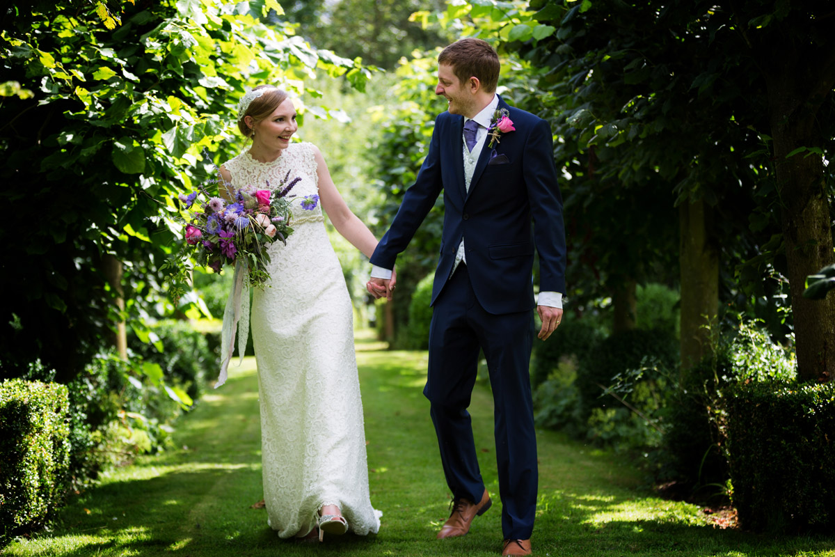 Couple in Garden at Dove Barn, Essex wedding