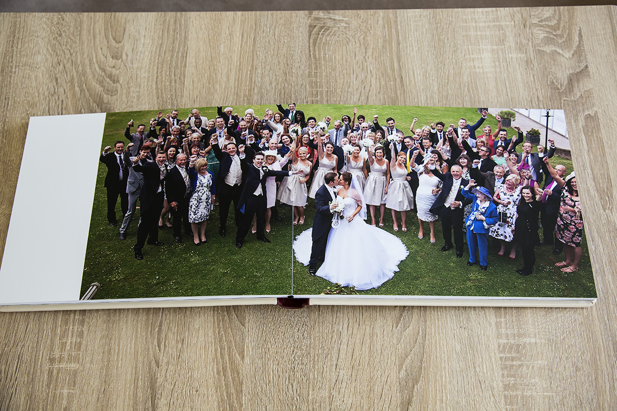 A sample two page spread in a Tom Needham Photography wedding album