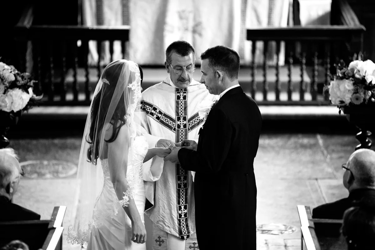 Wedding rings on the vicar’s order of service