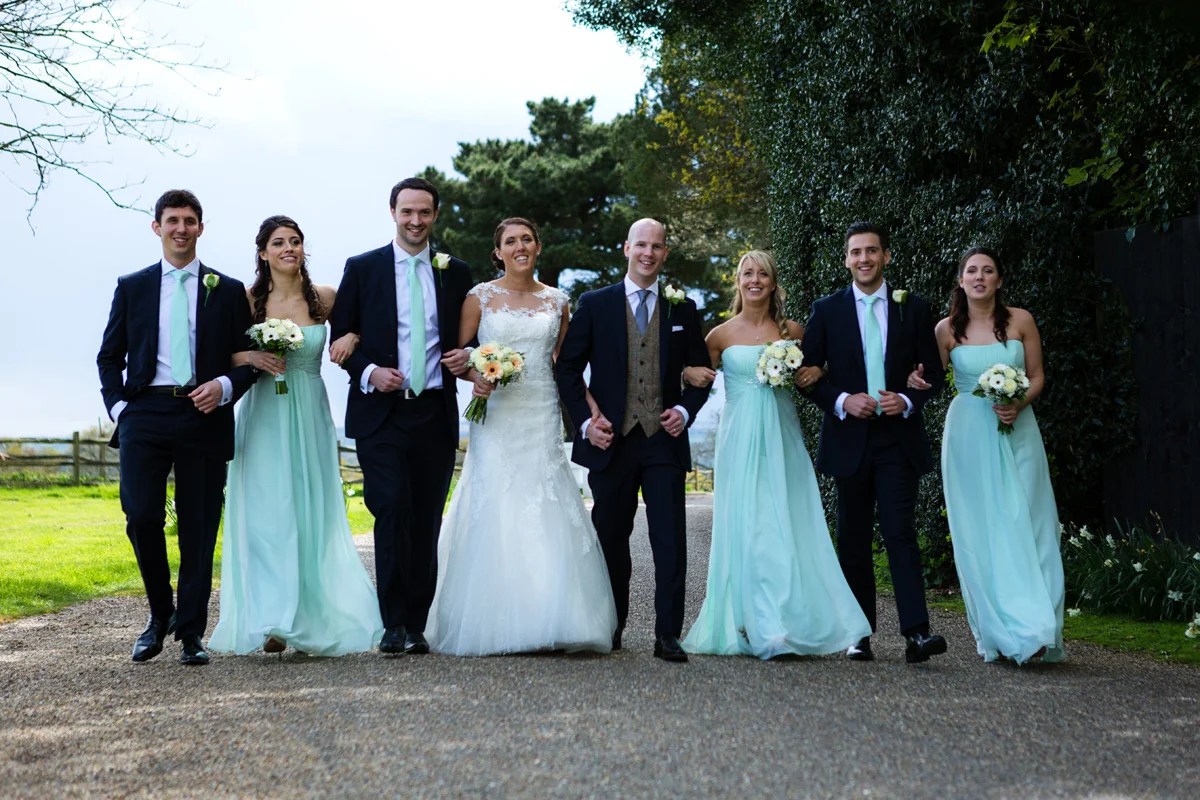 Bride and groom with bridesmaids and groomsmen at Gaynes Park