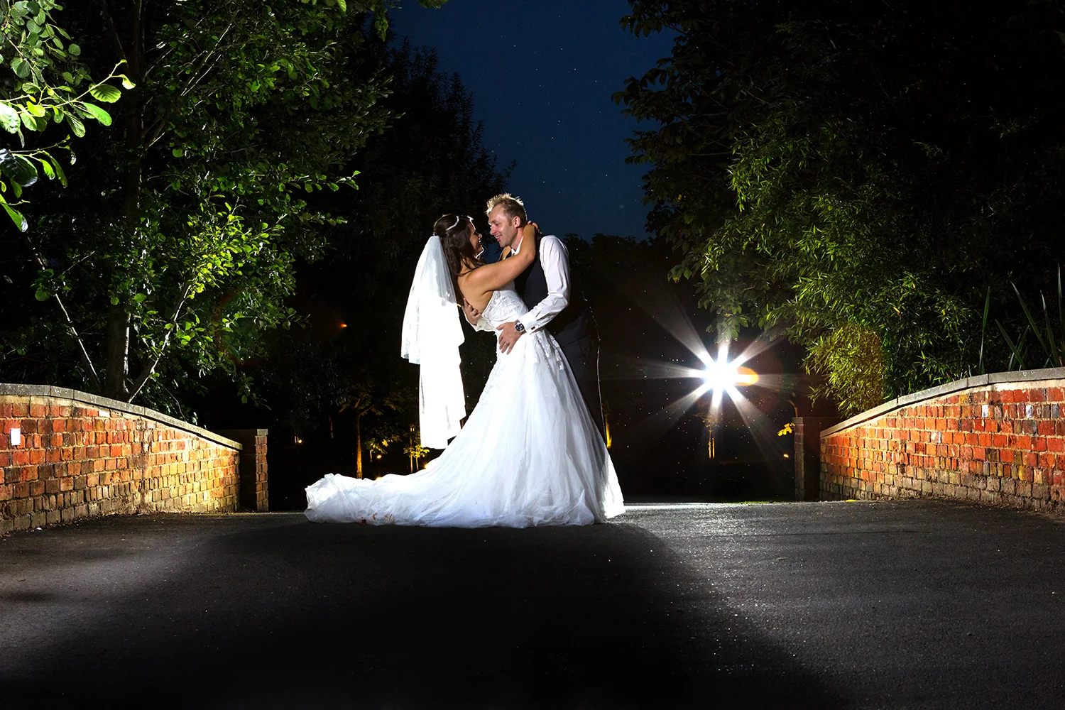 Bride and groom portrait using three lights at their Suffolk wedding