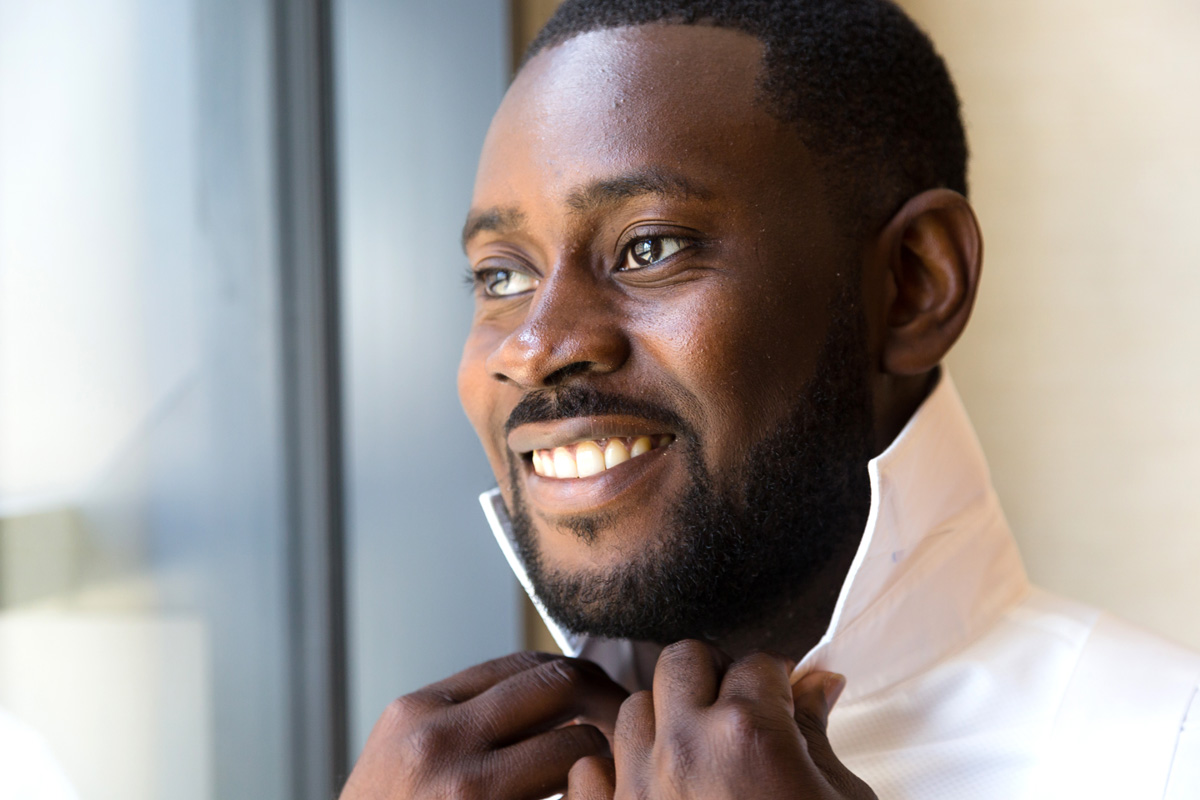 Groom portrait lit by window light