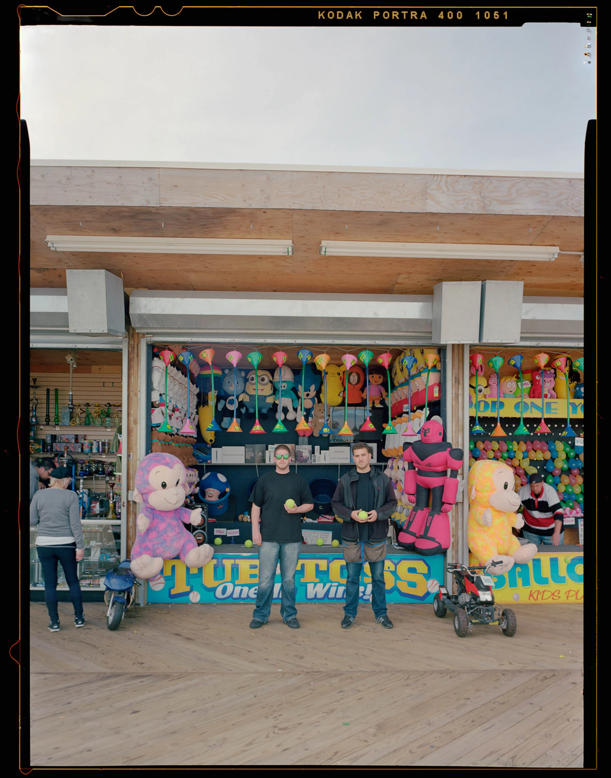 Anthony, Seaside, NJ 2014 4x5 Shen Hao. Anthony was super nice kid. I was walking around again with my 4x5 on my shoulder when he jumped out to see what my camera was. We started talking and I showed him how my camera works. I also showed him the stand in the ground glass of the 4x5 and he asked if I would photograph him and his business. I said, “Of course!” I mailed him a print later on that month cause he wanted them so bad. Nice guy.