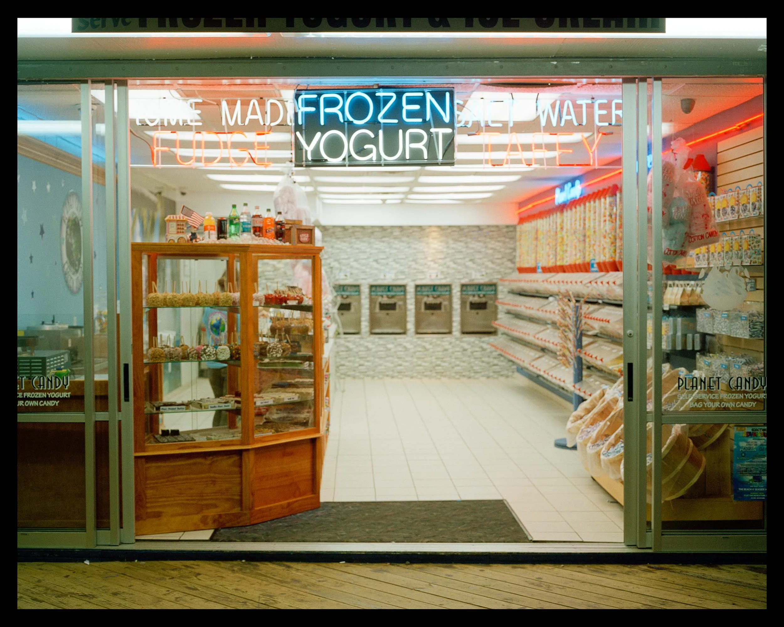 Frozen Yogurt, Seaside, NJ. 2015. Bronica ETRS. A little salt water taffy, candy apples, and frozen yogurt stand late night on the boardwalk.