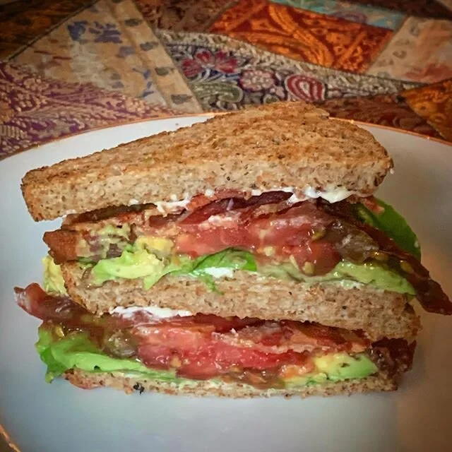 Quick pause from working for a BLT+avacado. 
Pro tip: rub your toasted bread with a fresh clove of garlic 🔥 
#noregrets