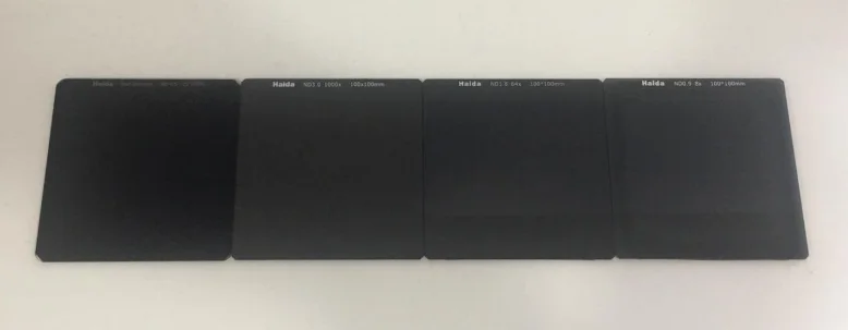 Comparison between Haida neutral density filters. (From left to right) Haida 15 stop neutral density filter, Haida 10 stop neutral density filter, Haida 6 stop neutral density filter, Haida 3 stop neutral density filter.