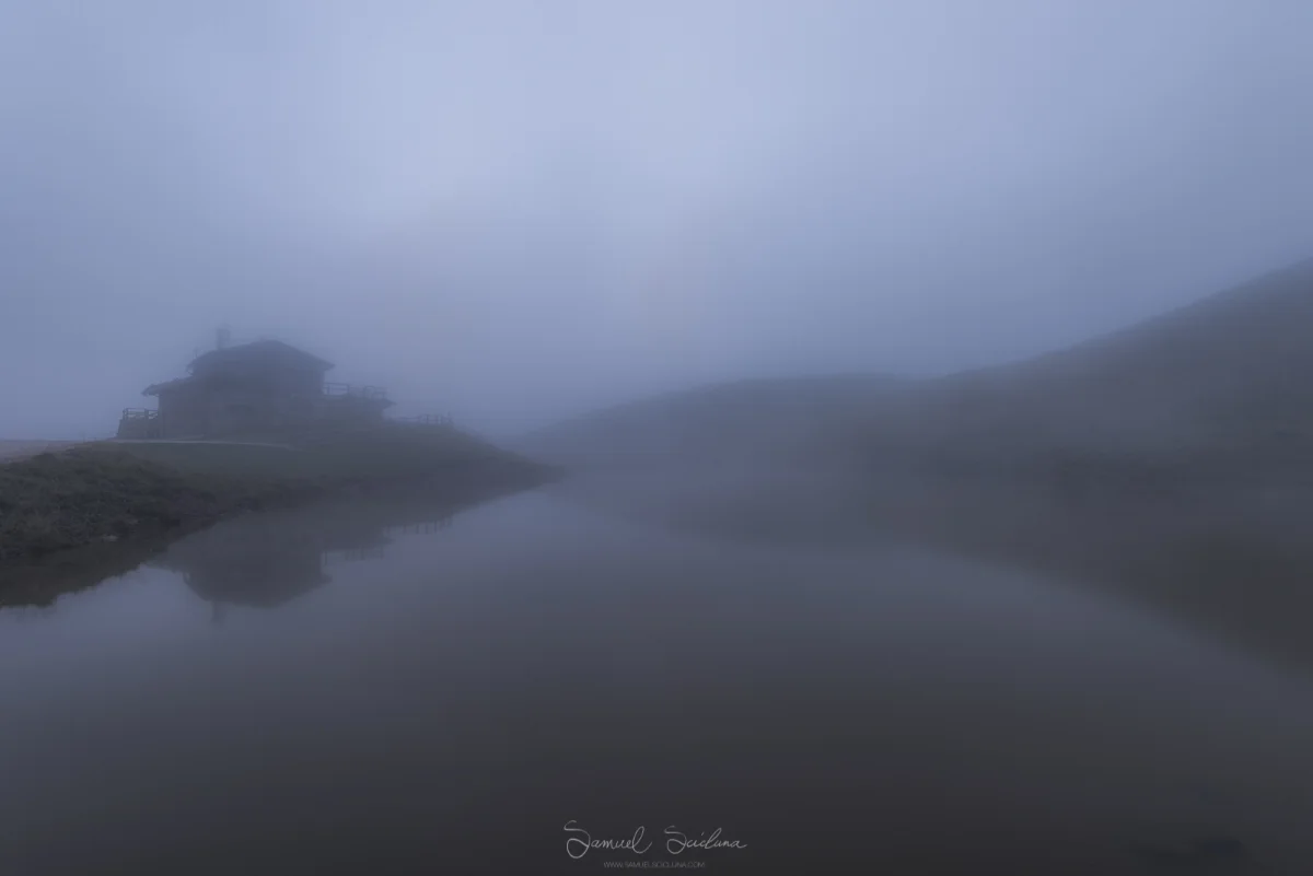 Completed fogged up! A Rifugio (Less than 50 meters away) is barely visible and the mountain peaks are non existent.