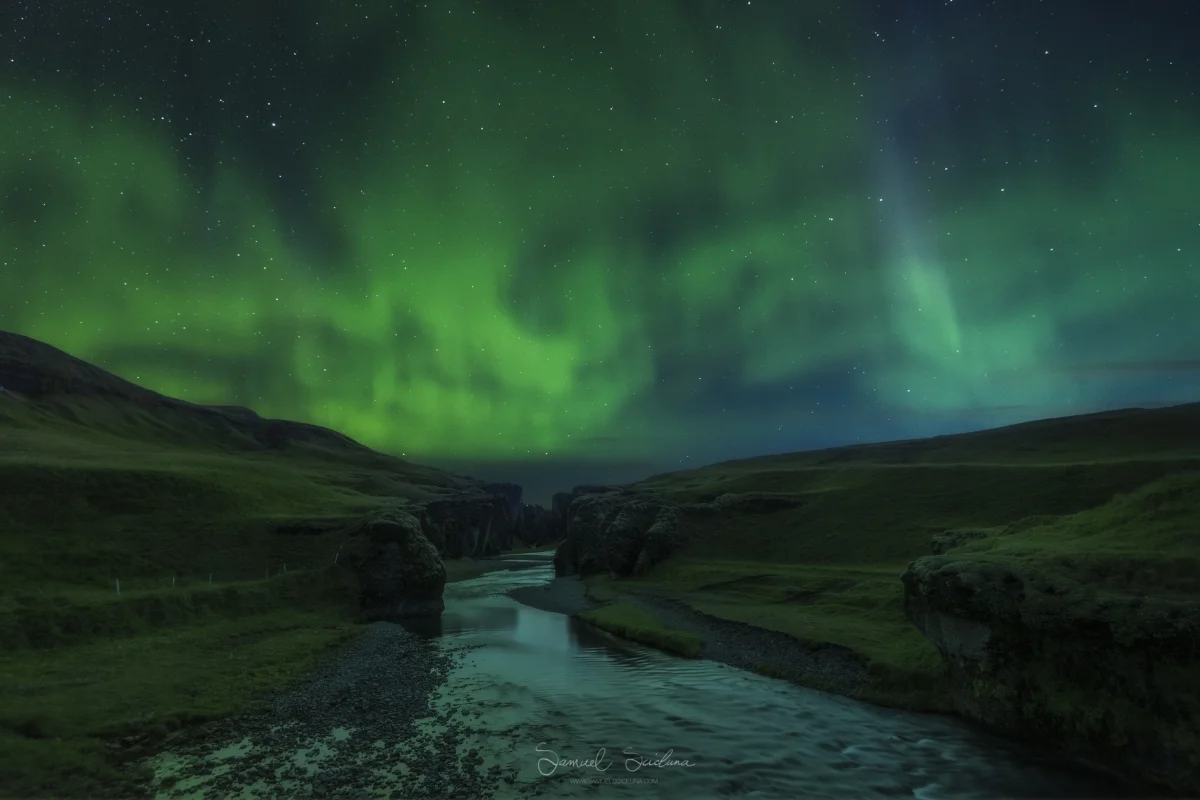 The Northern Lights (Aurora Borealis) over Fjaðrárgljúfur canyon.