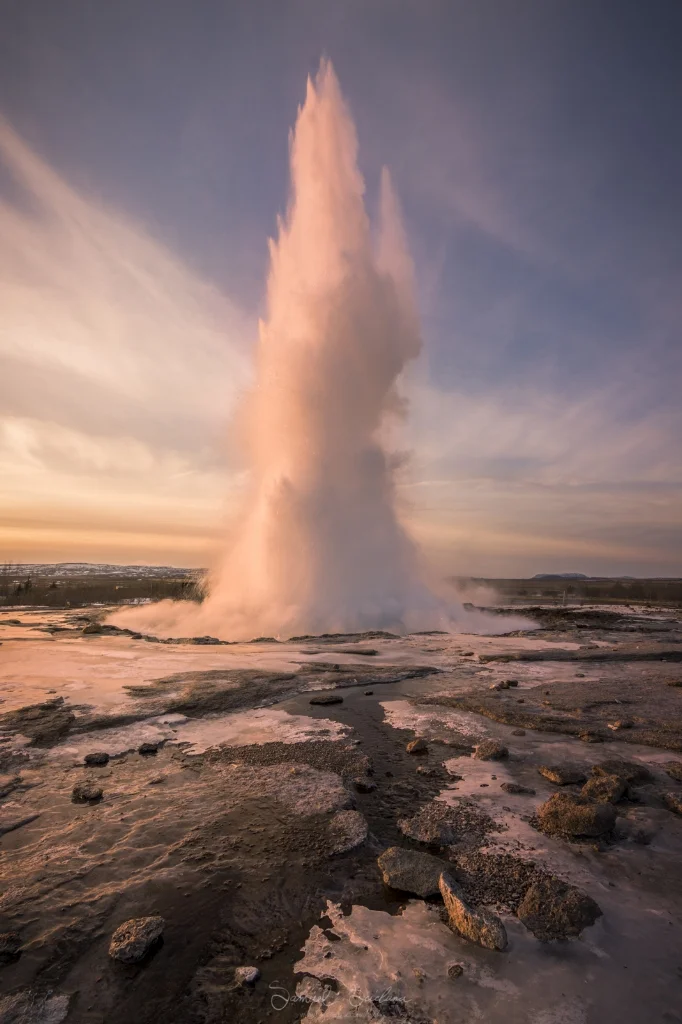 The first light after sunrise hits the epic Strokkur geysir, as it shoots steam upto 20 meters high!