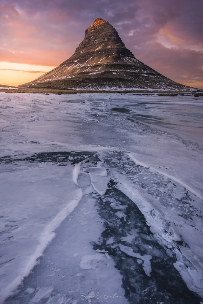 I found a cone shaped patch on the frozen lake and used this as a leading line, but also as it mirrors the shape of the mountain. The high clouds caught the light before sunset and helped make a great shot!
