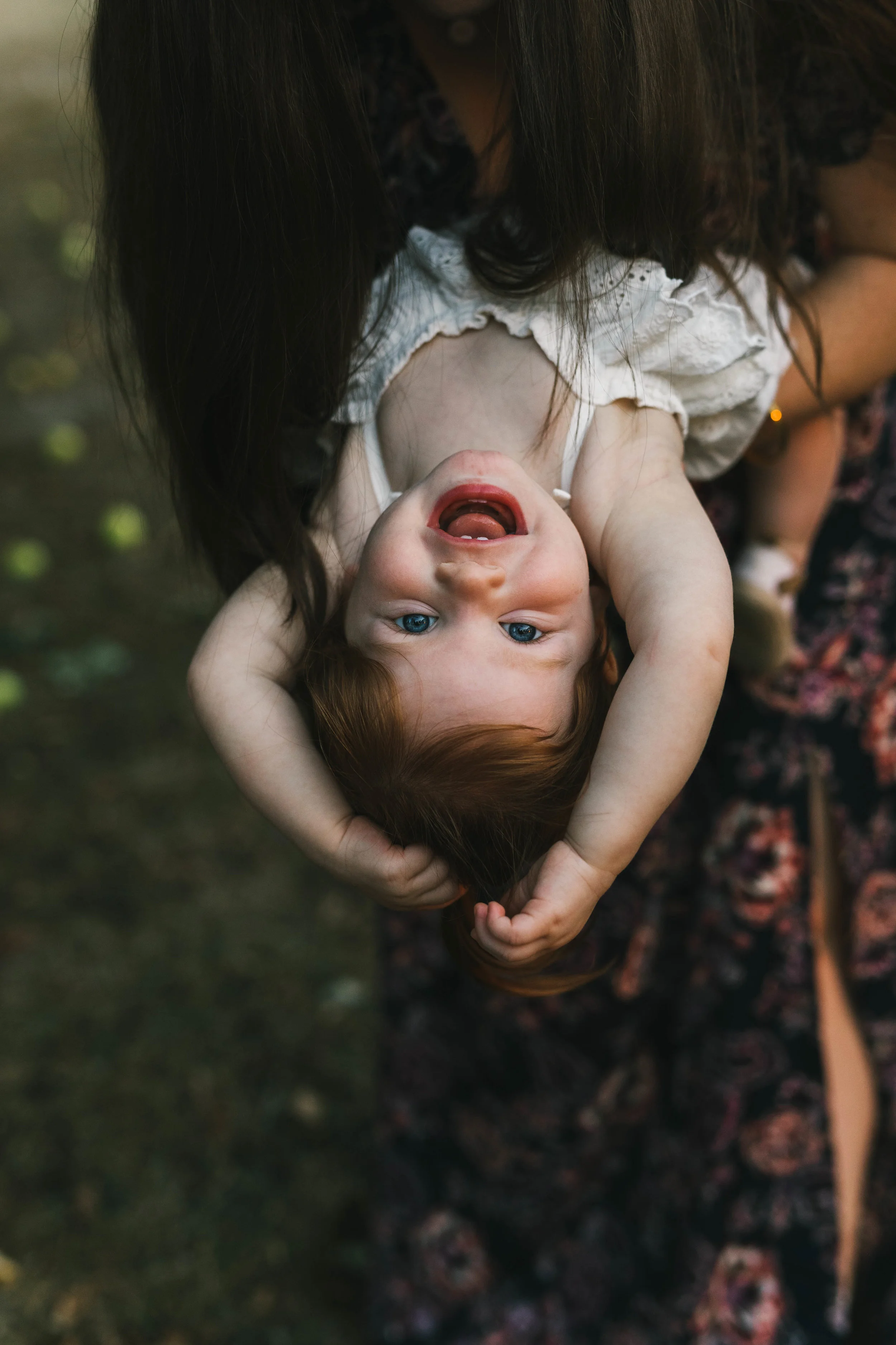 Playful and sweet family session in Issaquah at golden hour and twilight Mom and Dad with their toddler photographed by Chelsea Macor Photography in a playful and intimate way-8.jpg