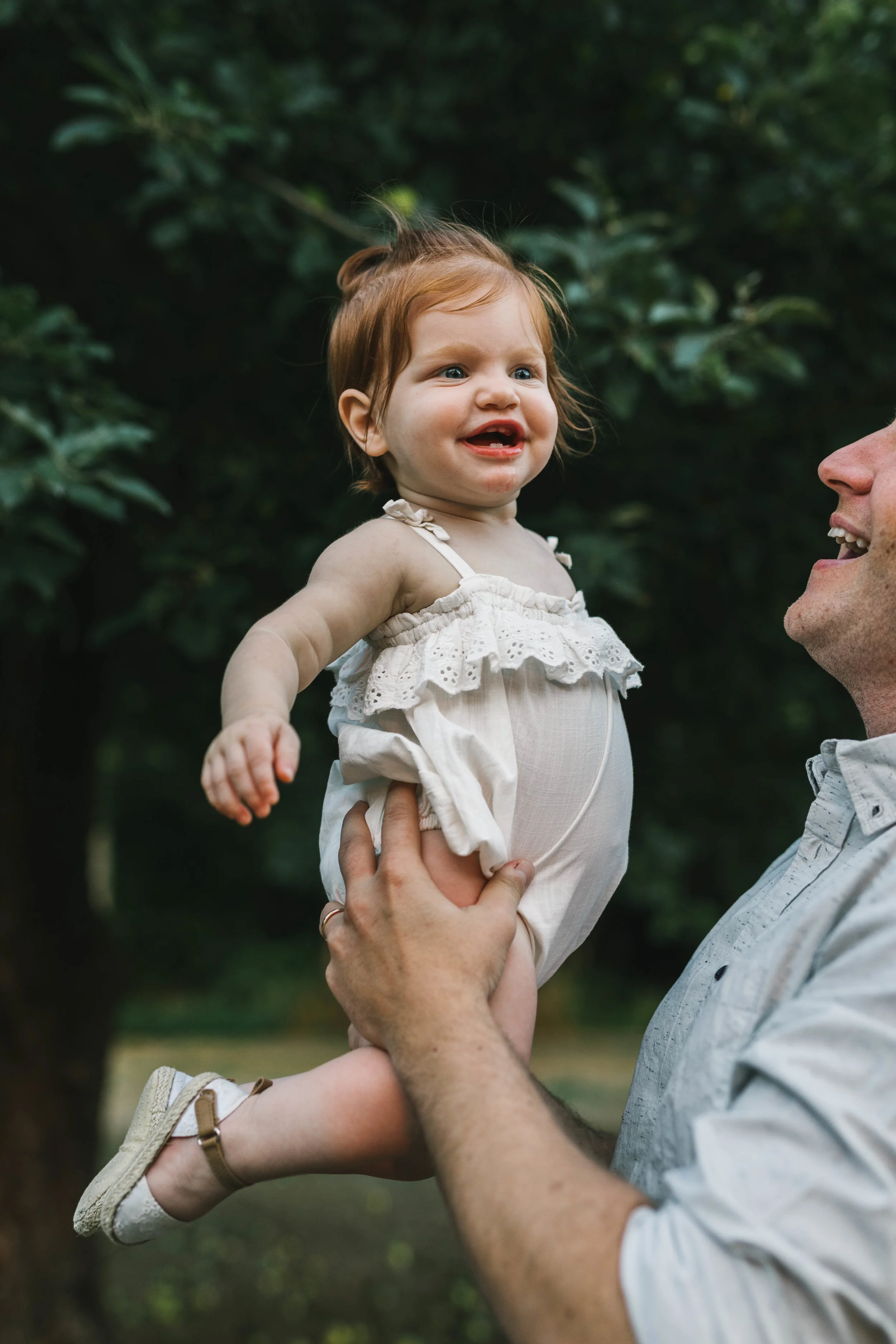 Playful and sweet family session in Issaquah at golden hour and twilight Mom and Dad with their toddler photographed by Chelsea Macor Photography in a playful and intimate way-13.jpg