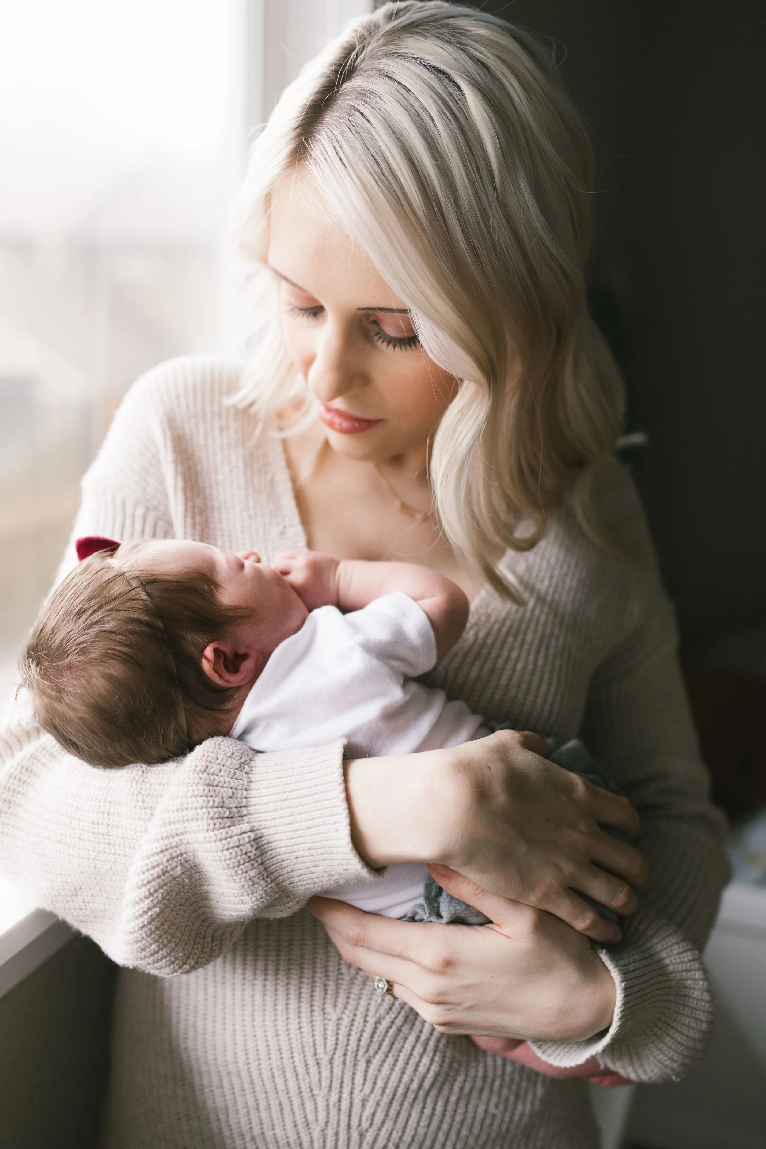 a light filled newborn session in a seattle family's home by Chelsea Macor Photography-2.jpg