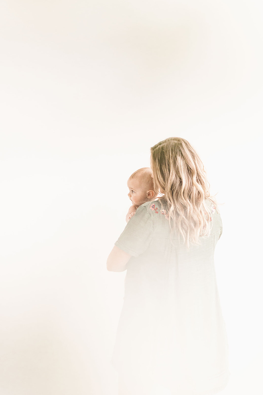 Mother_and_child_captured_in_a_natural_light_Seattle_studio_photographed_by_Chelsea_Macor_Photography-5.jpg