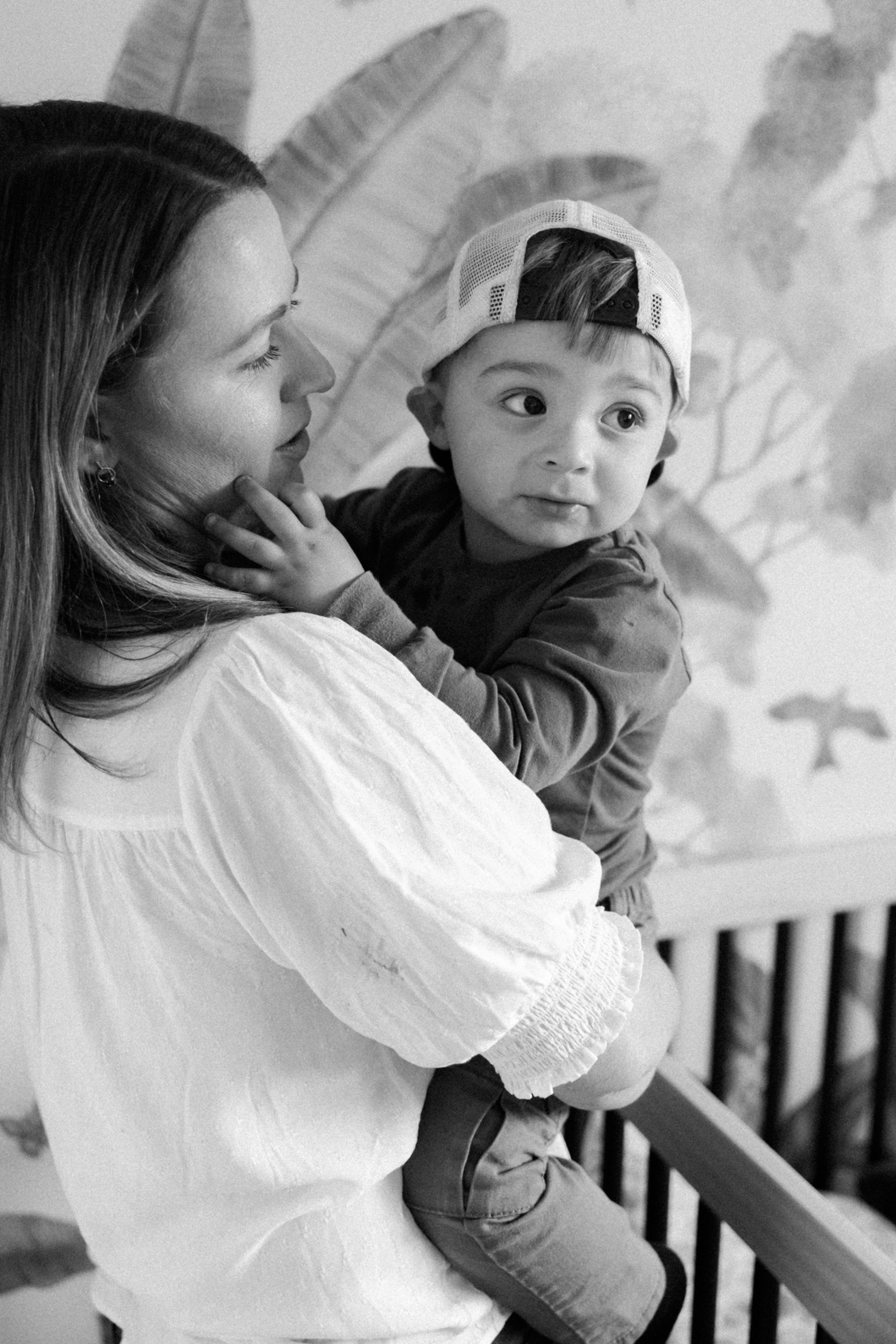 Photograph of a mother and her child in his Seattle room by Chelsea Macor