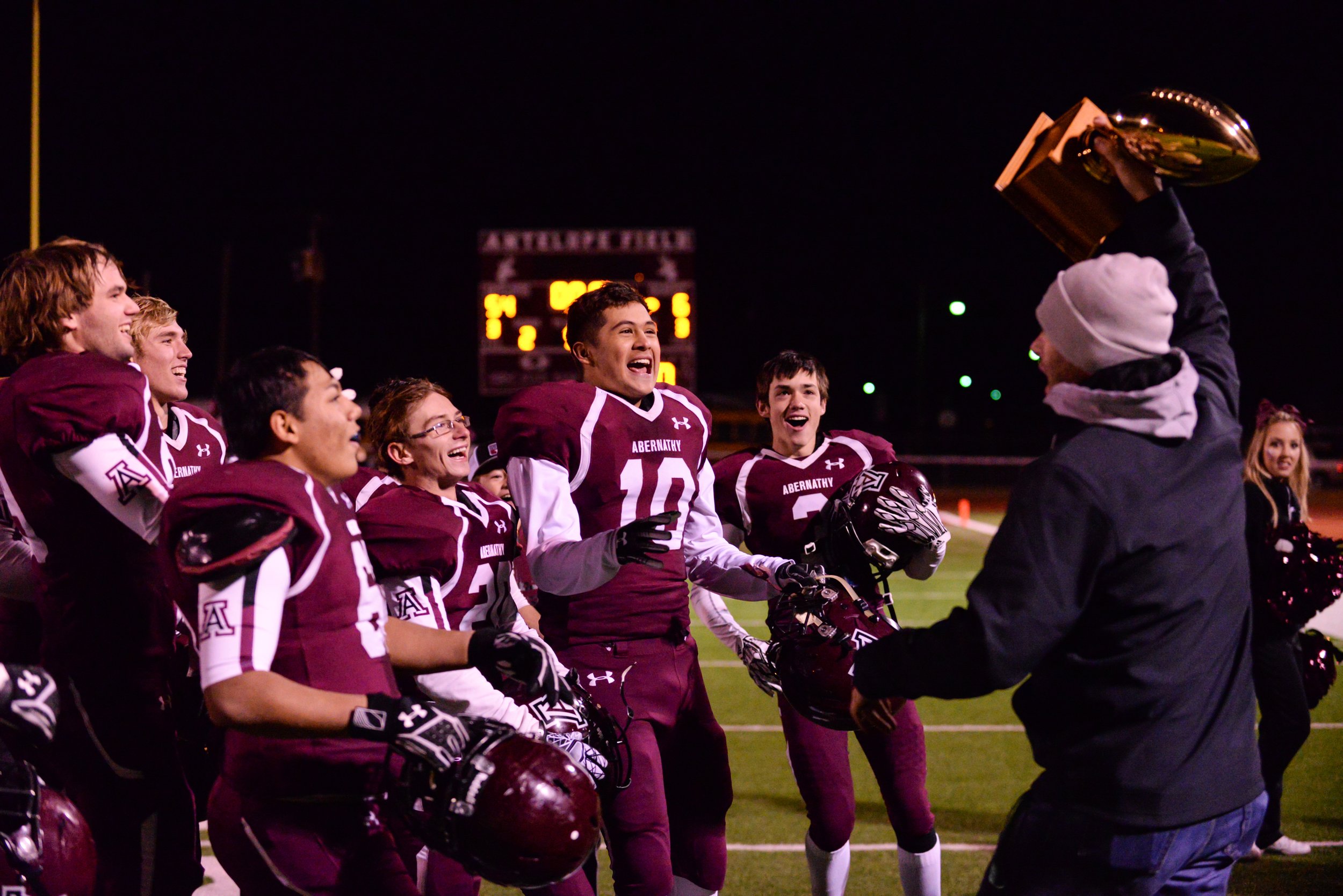  The Abernathy football teams celebrates at the sight of the district championship trophy following the game against Idalou Friday, Nov. 9, 2018, at Antelope Stadium in Abernathy, Texas. [Abbie Burnett/A-J Media] 