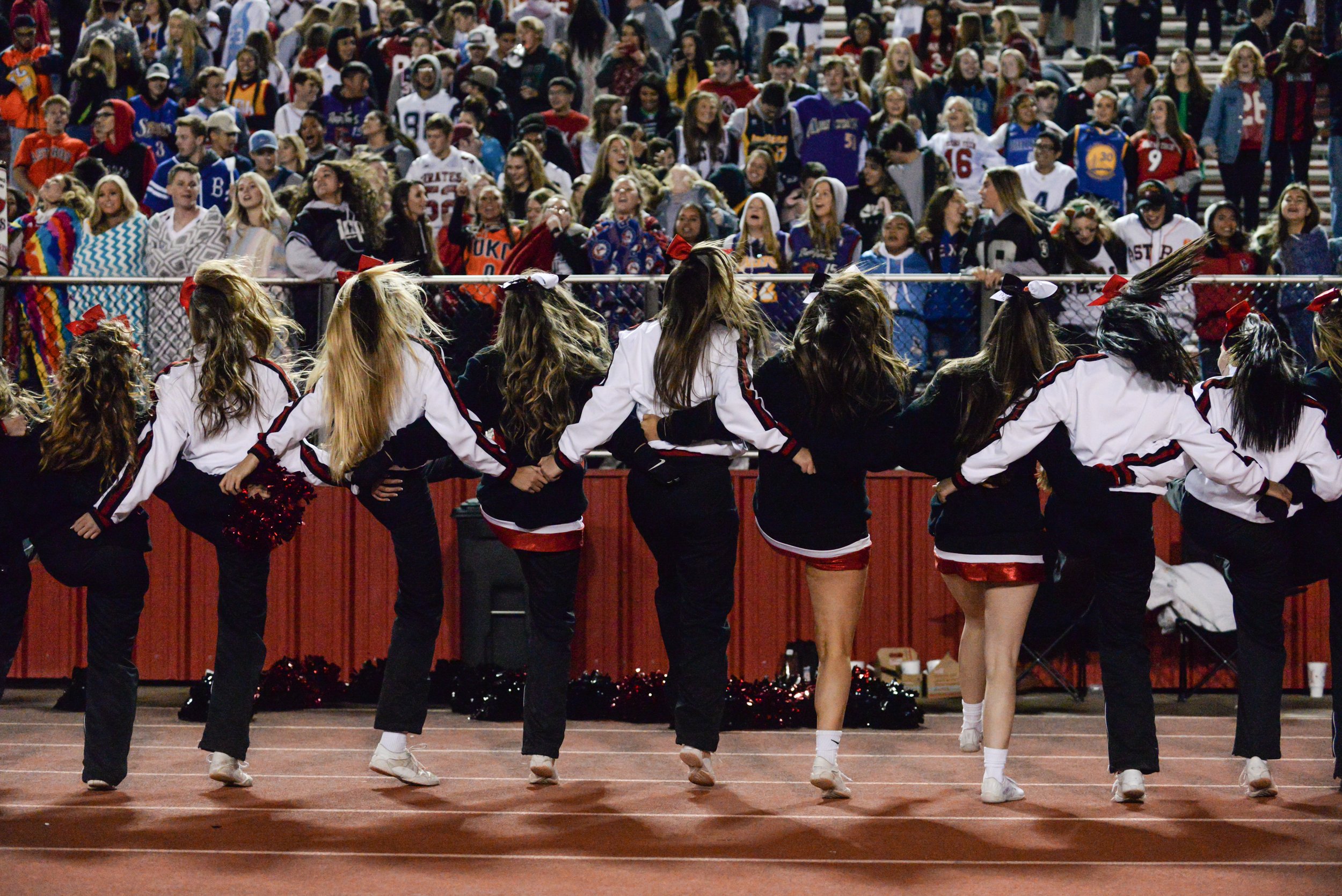  The Lubbock-Cooper Cheer and Pom Squad pump up the student section during the game Friday, Nov. 2, 2018, at Pirate Stadium in Woodrow, Texas. [Abbie Burnett/A-J Media] 