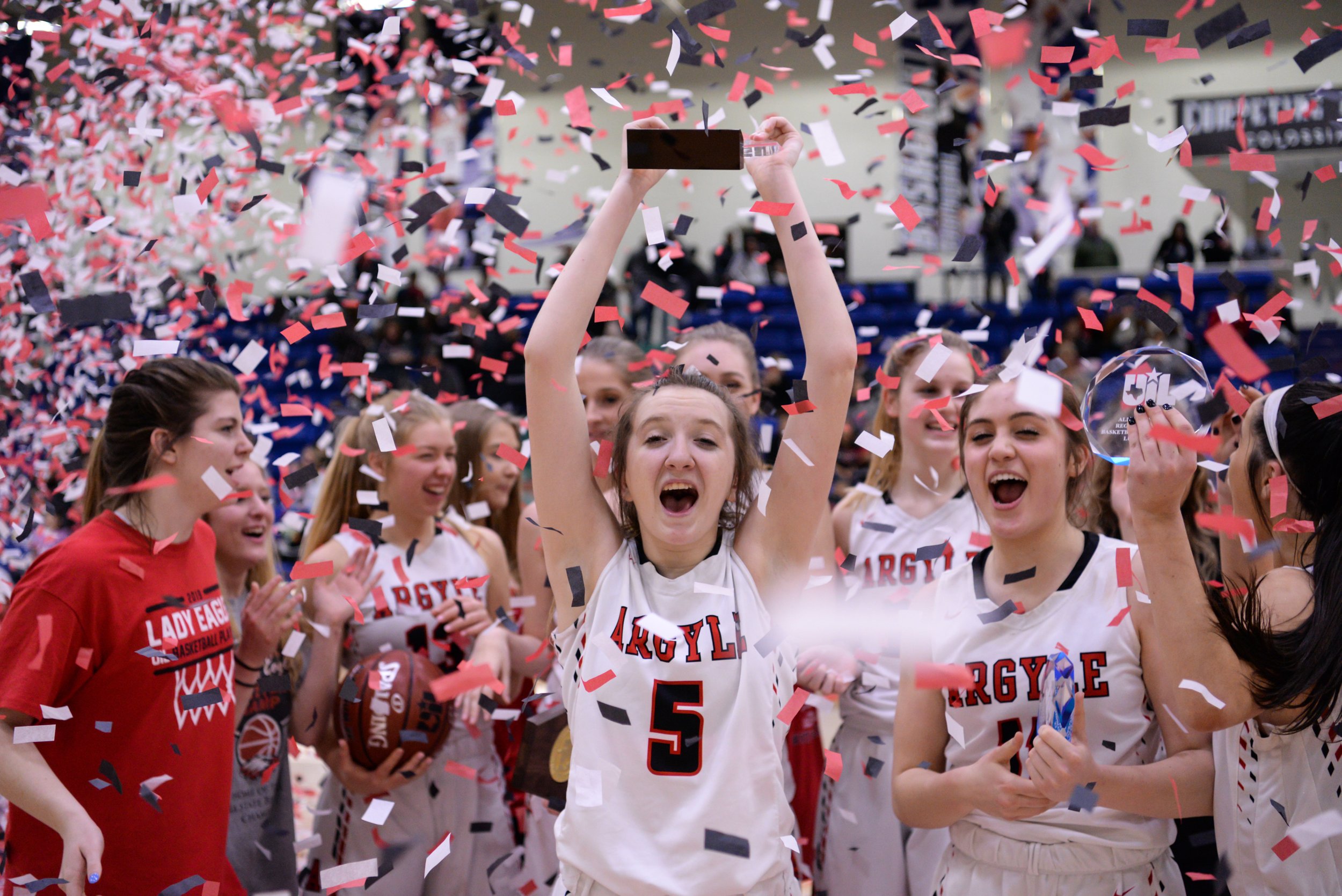  Argyle's Rhyle McKinney (5) celebrates winning the 4A Region 1 championship game and most valuable player against Levelland Friday, Feb. 22, 2019 at Rip Griffin Center in Lubbock, TX. Argyle defeated Levelland 52-37. [Abbie Burnett] 