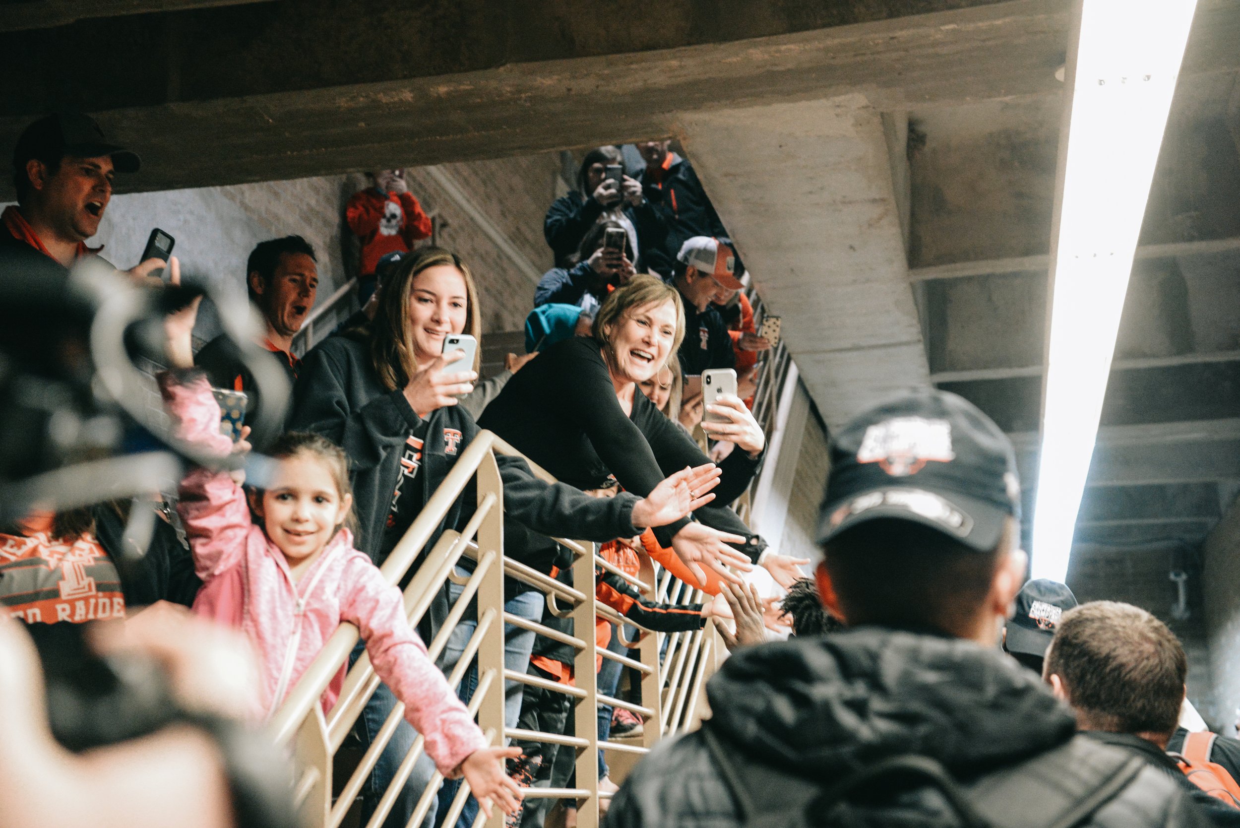  The Texas Tech basketball team is greeted by cheering supporters Saturday, March 9, 2019 at United Supermarkets Arena. Texas Tech clinched a share of the Big 12 Conference regular season title after beating Iowa State. The Red Raiders shared the hon