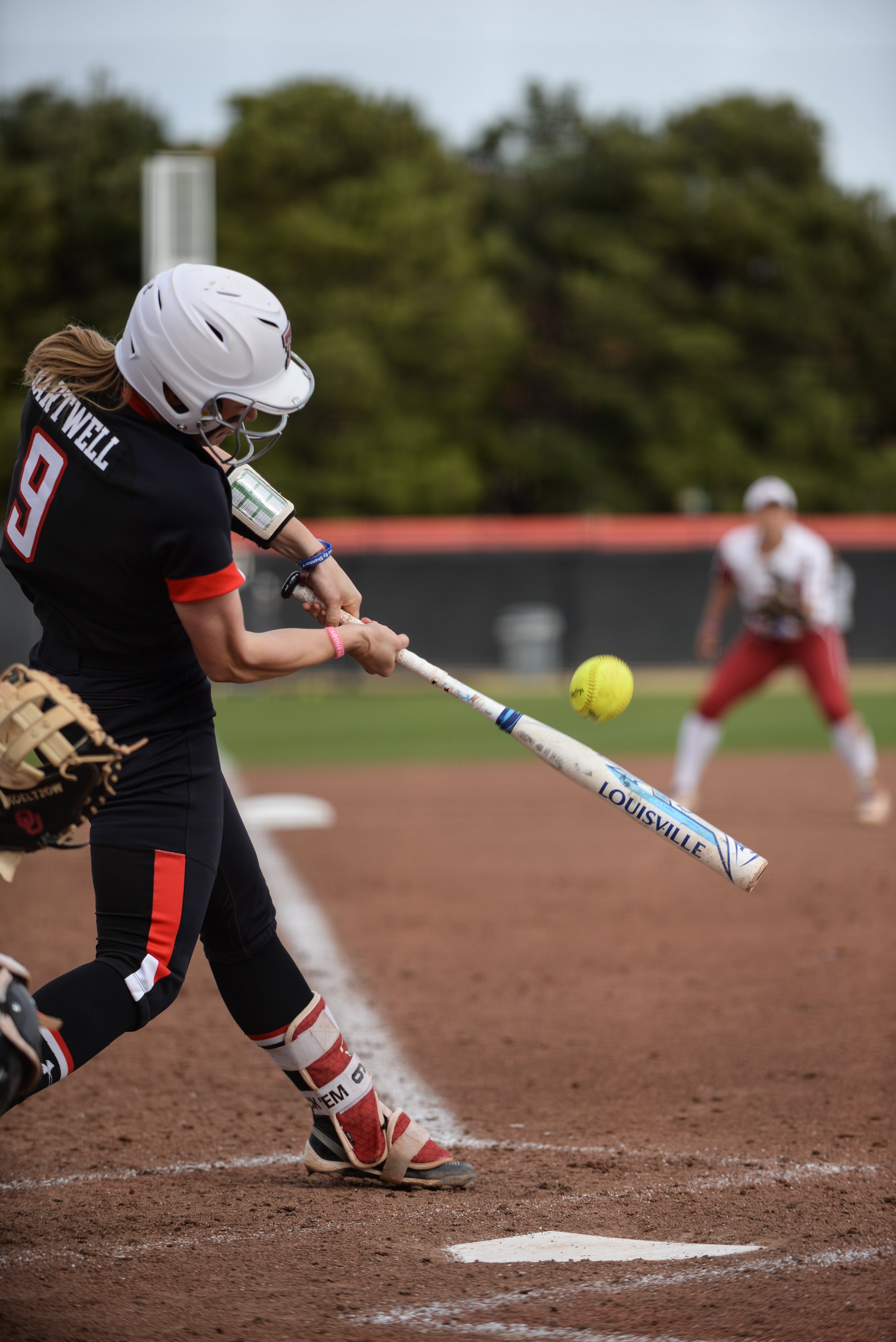 Texas Tech's Jessica Hartwell (9) hits a single during the second of a three game series against Oklahoma Saturday, March 23, 2019 at Rocky Johnson Field in Lubbock, Texas. The Lady Raiders lost to the Sooners 8-3. [Abbie Burnett/A-J Media] 