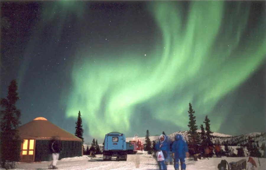 Aurora over Yurt and Snow Coach photo by Shigeo Mori