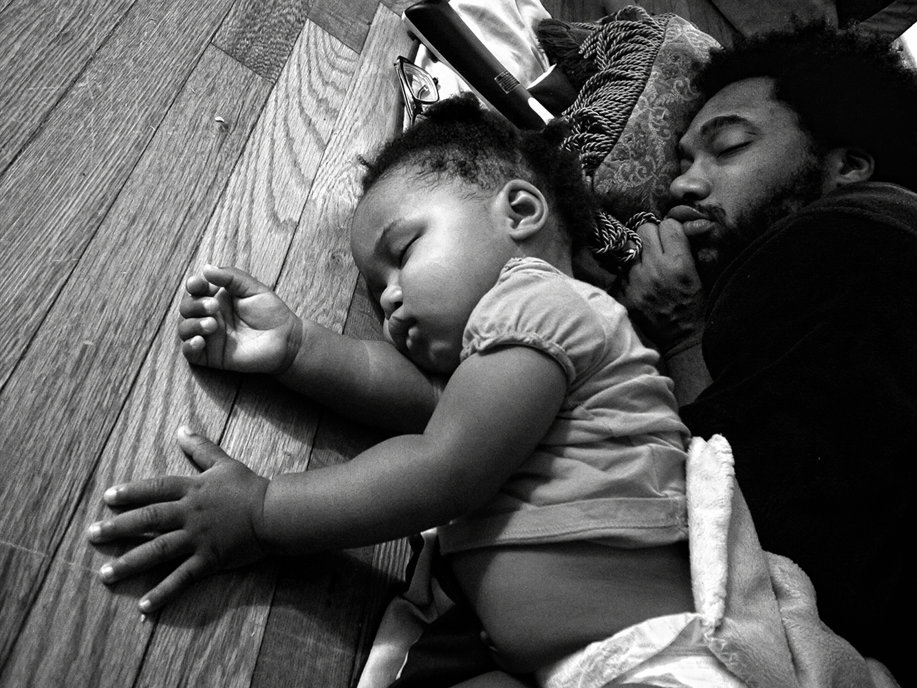  Zun Lee,  Anthony Francis falls asleep with daughter Tena in front of his TV , Camp Lejeune, NC, 2012 