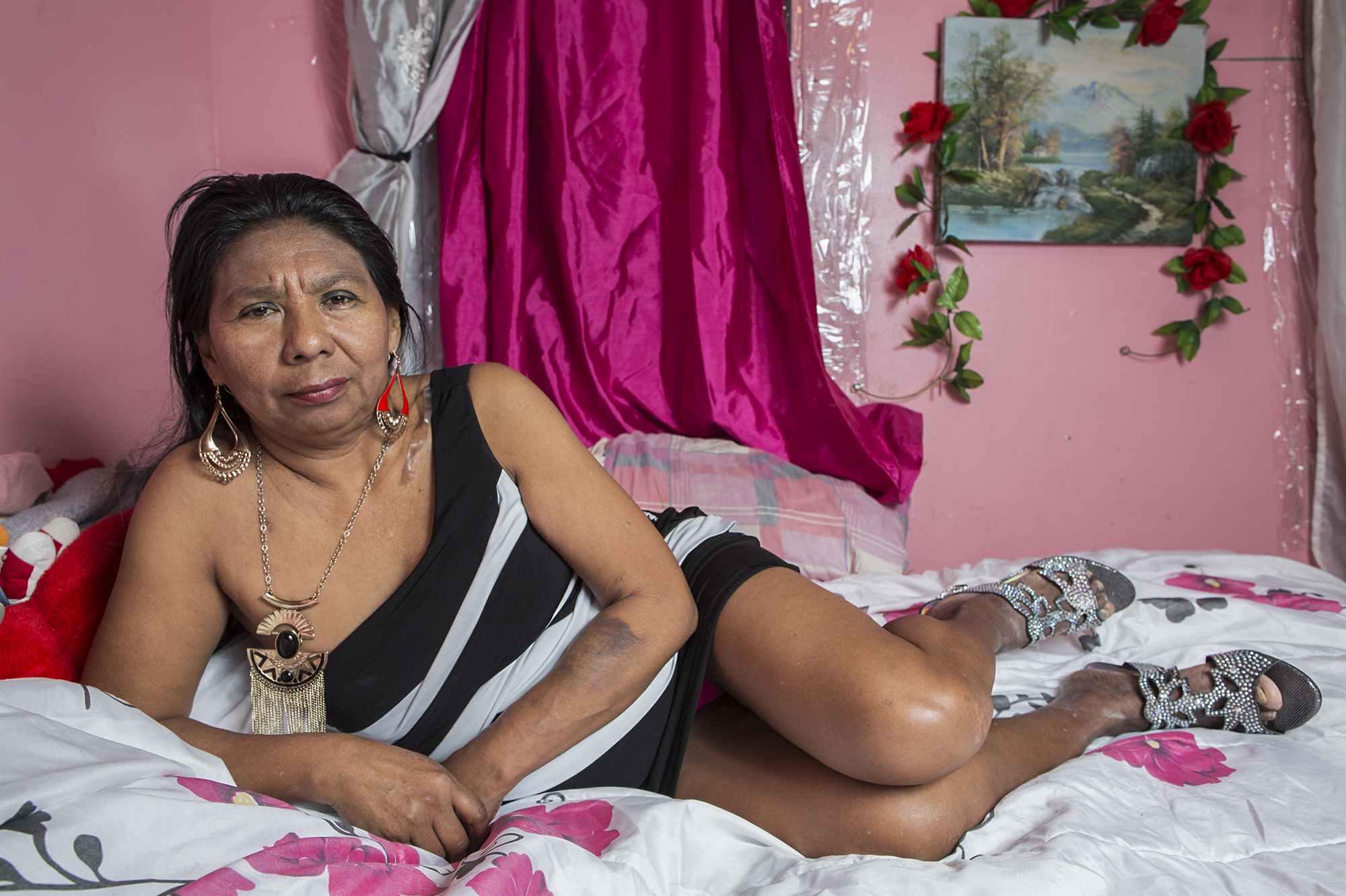  Dionisia Martínez, in her bedroom on 45th Street in Sunset Park, Brooklyn. She is a singer and dancer of Mexican folklore. Born in Atencingo, Puebla, she has been based in New York since 2002. Since then she has worked washing dishes in restaurants,