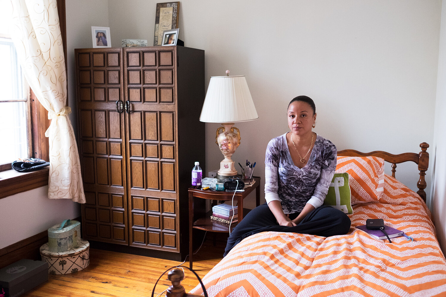  Keila, 40, in transitional housing six months after her release. Astoria, NY, 2014. Image © Sara Bennett. 