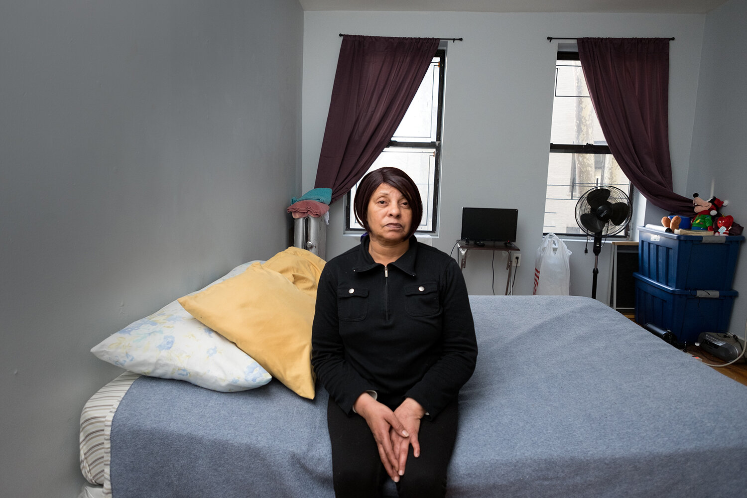  Valerie, 62, in an apartment she shares with a roommate. Bronx, NY, 2018. Image © Sara Bennett. 