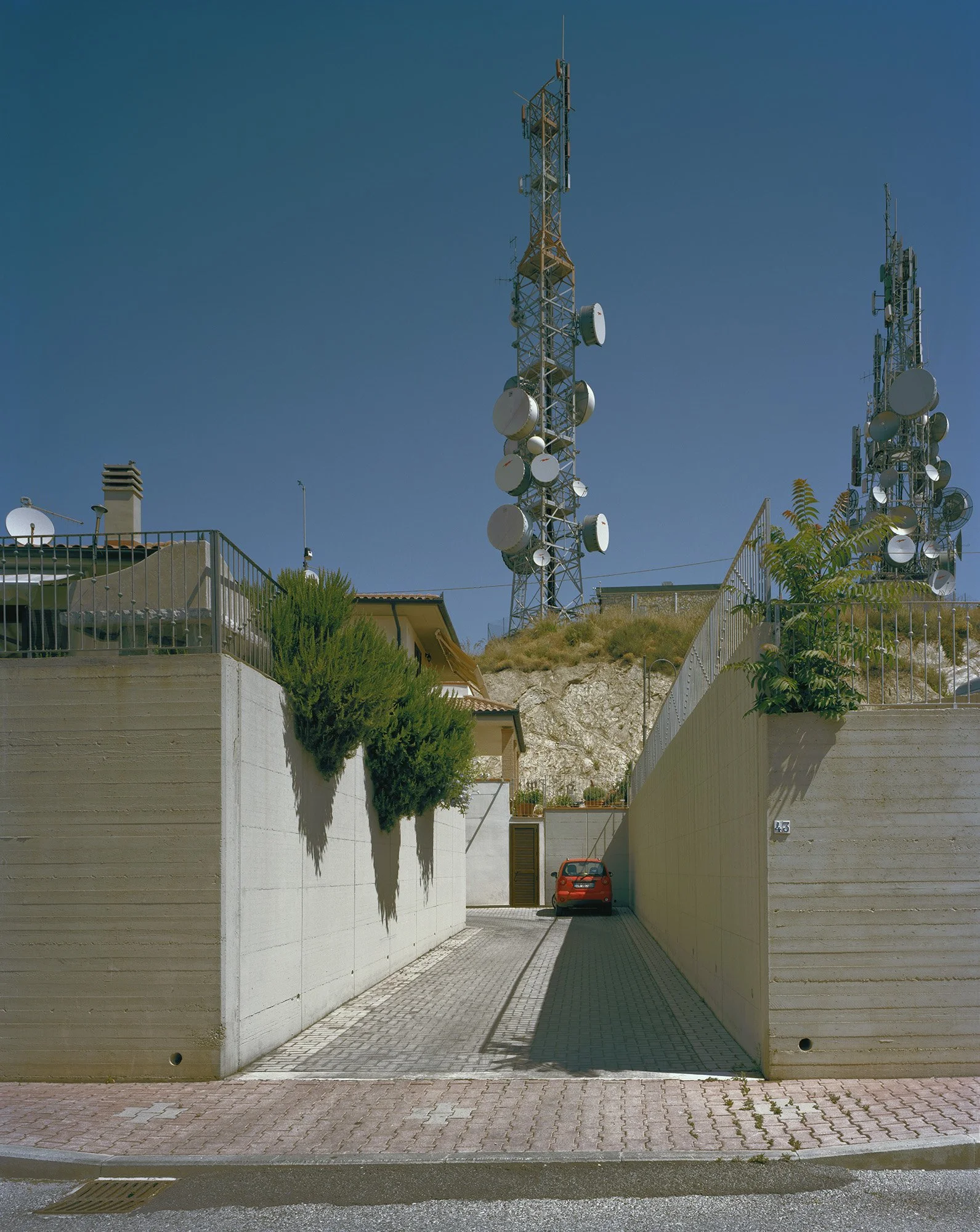    Cell Towers, Red Car, Livorno, Italy, 2010