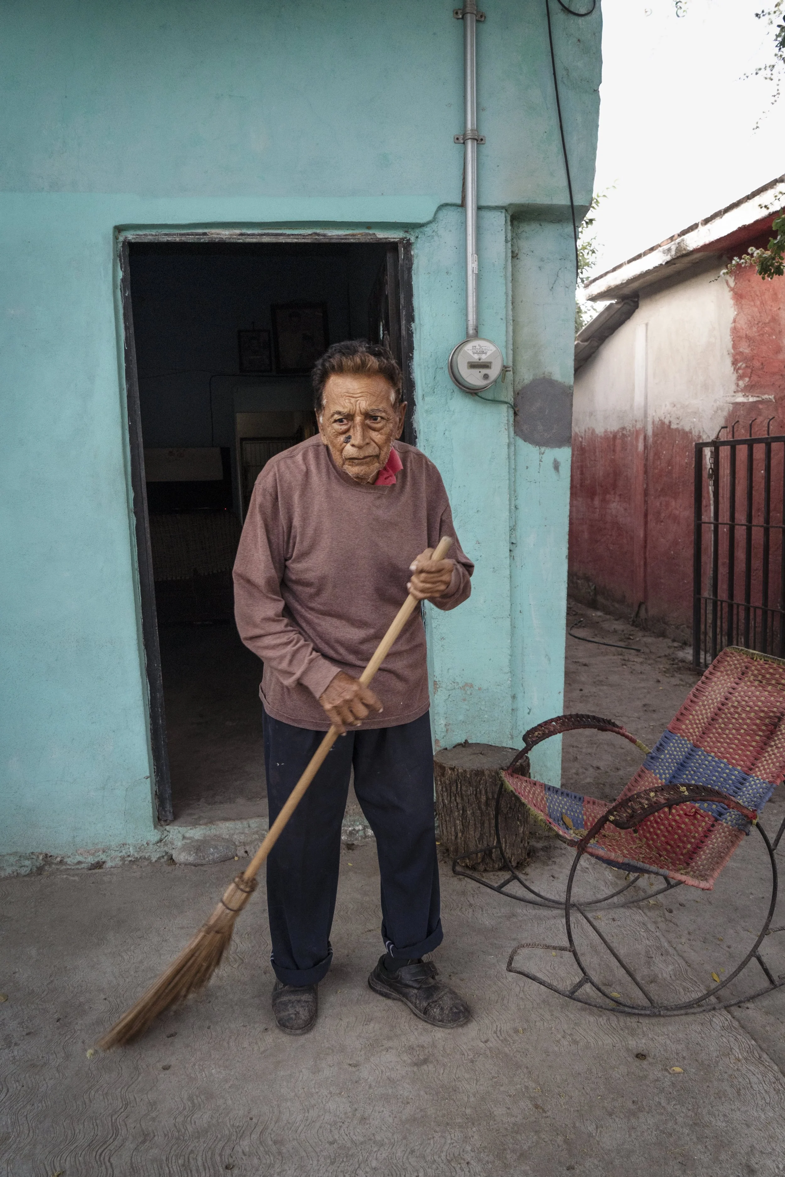 Sweeping man La Placita, Michoacan, MX 2024 M. Bruce Hall.jpg