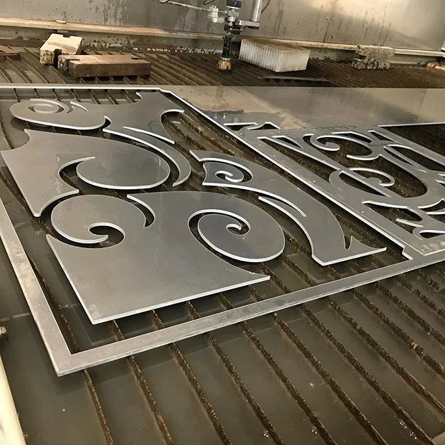 Fresh off our @flowwaterjetofficial are some scroll pieces for a client. #aluminum #flowwaterjet #waterjet #cnc #cncmachining #machinist #machining #solidworks #cad #caddesign #fabrication #metal