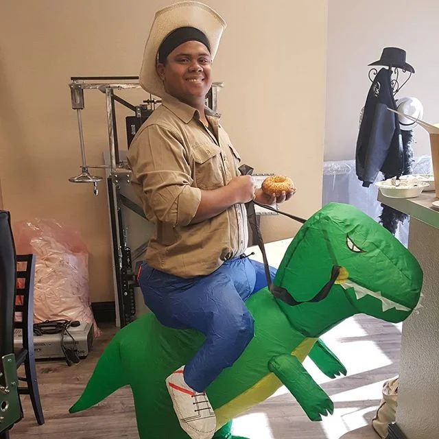 Shanes halloween costume. That dinosaur should help with moving material around.