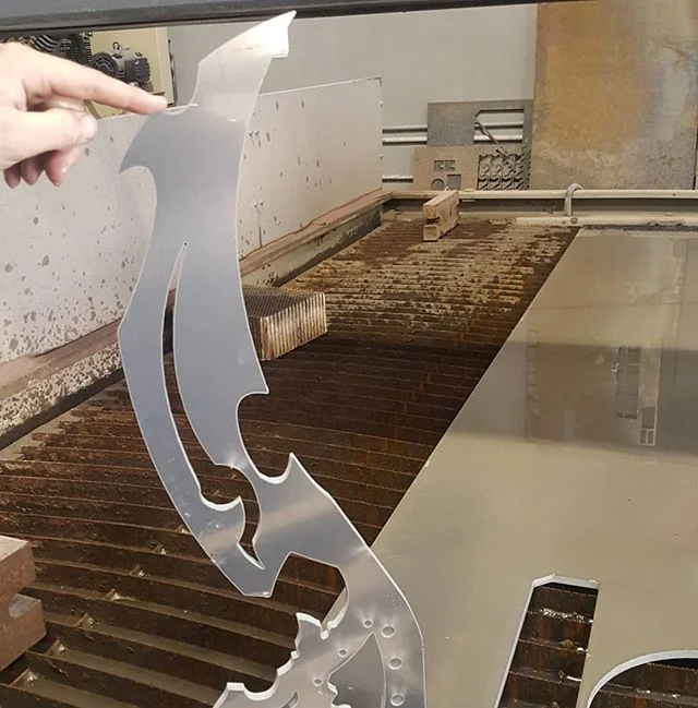 Cool parts coming off the waterjet today. Working on something special. #esportsarena #customfabrication #flowwaterjet #solidworks