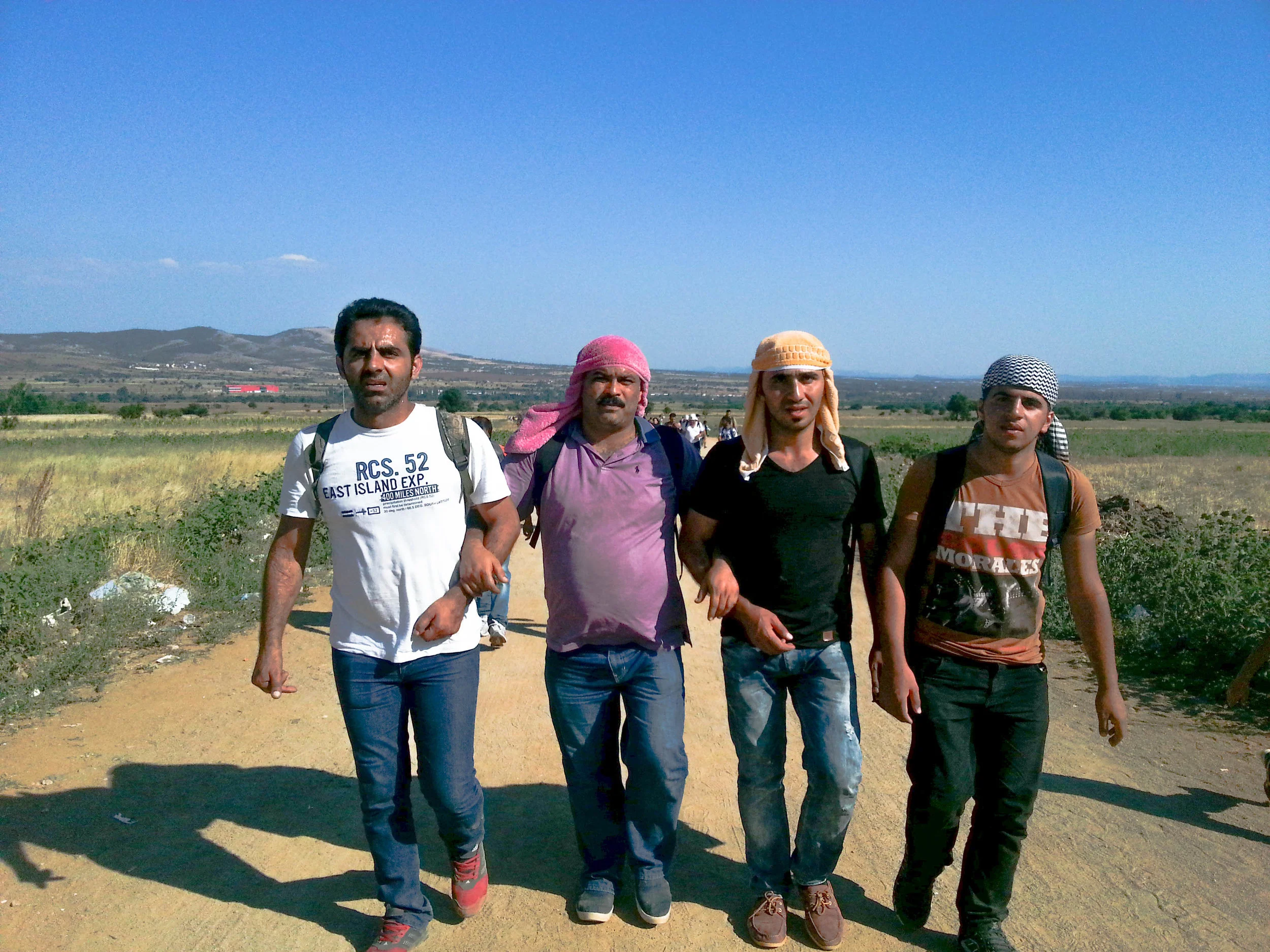 From left to right: Rashed, Ahmed, Ramadan and Mahmoud -- all who worked at Salloura in Istanbul -- crossing European borders by foot in the August heat. (Photo courtesy of Ramadan)