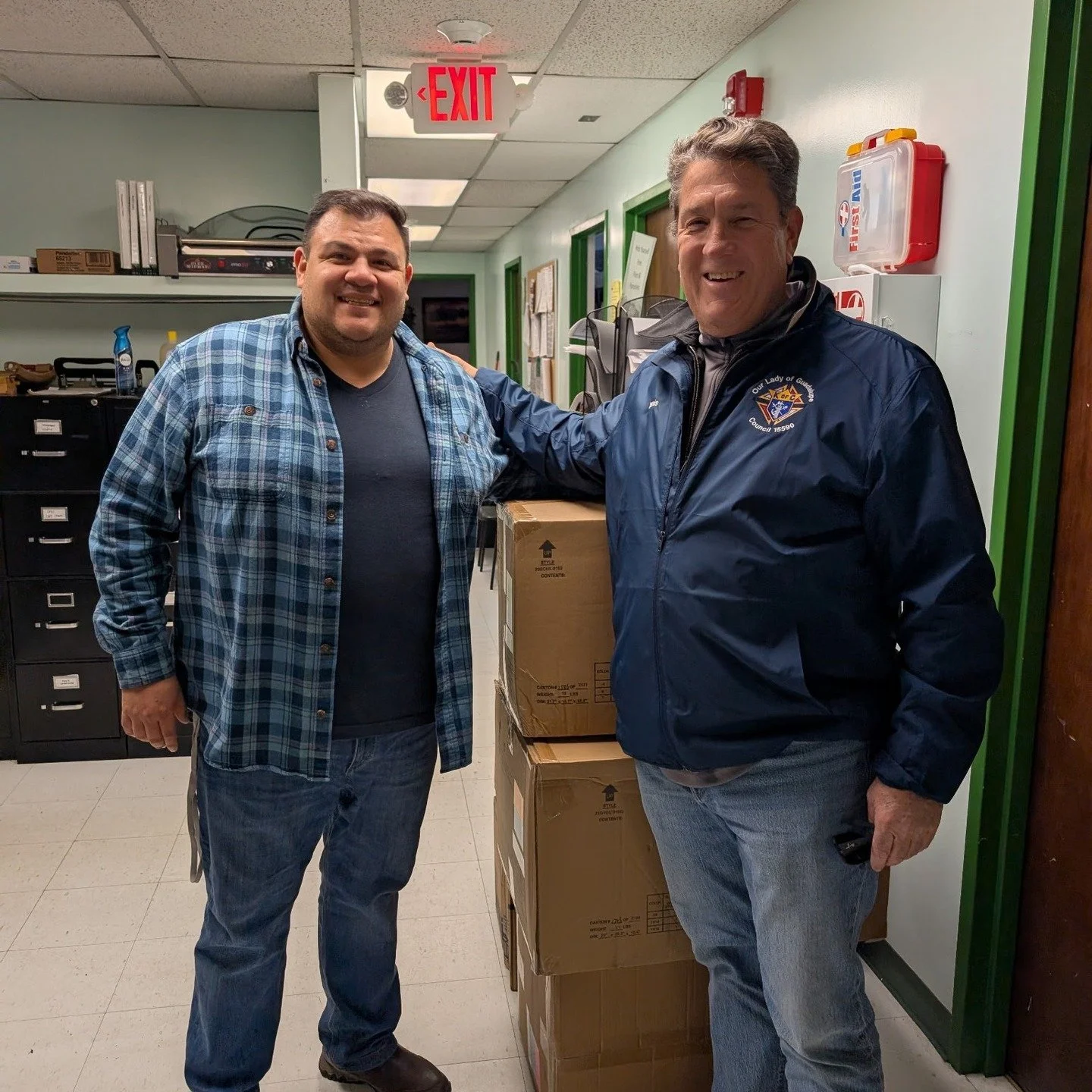 Our Lady of Guadalupe Council 15590 support Coats for Kids with their donation to St Katherine Drexel.