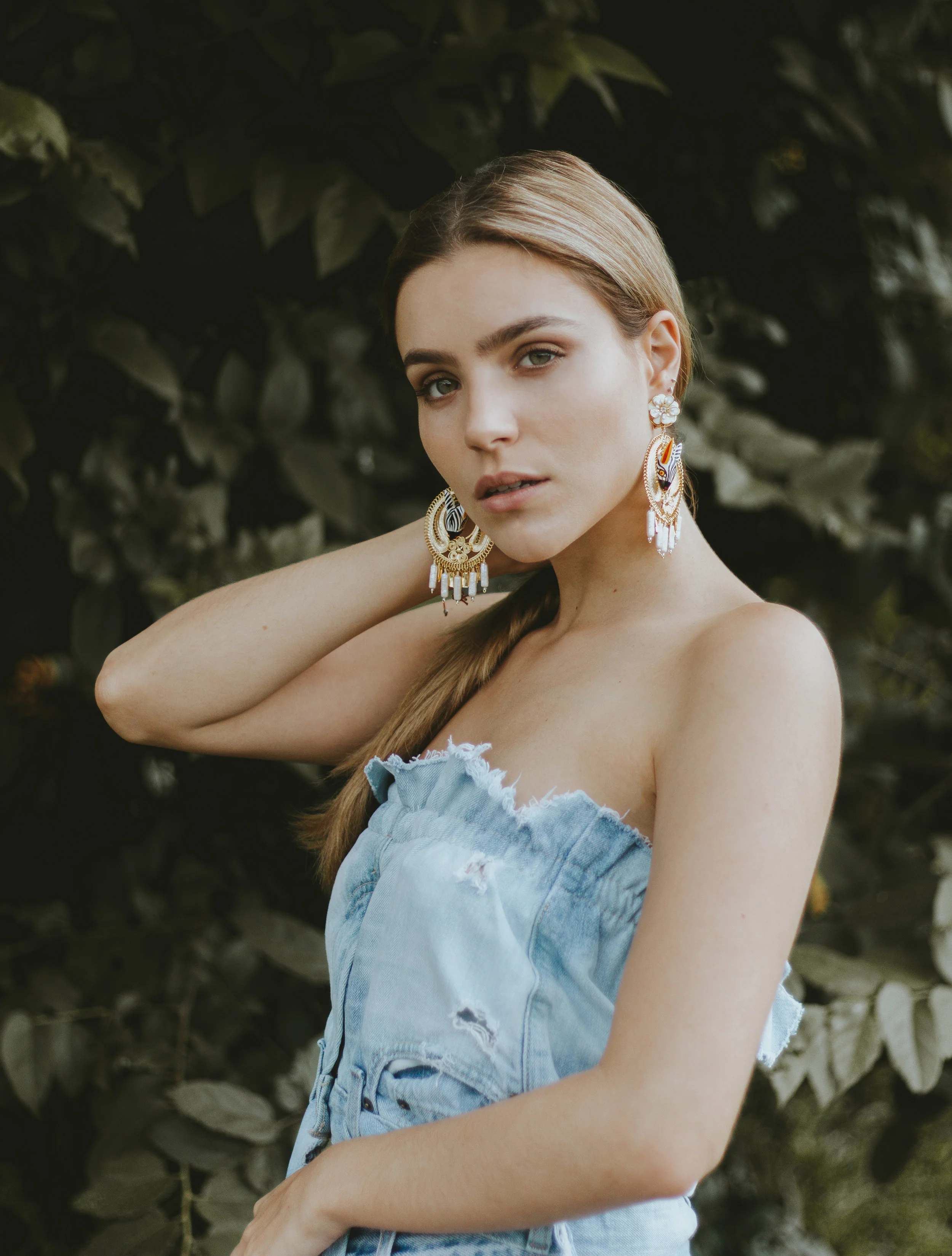 Andrea Kader tube top Levi's reworked denim Mercedes Salazar earrings via Corazon de Piña