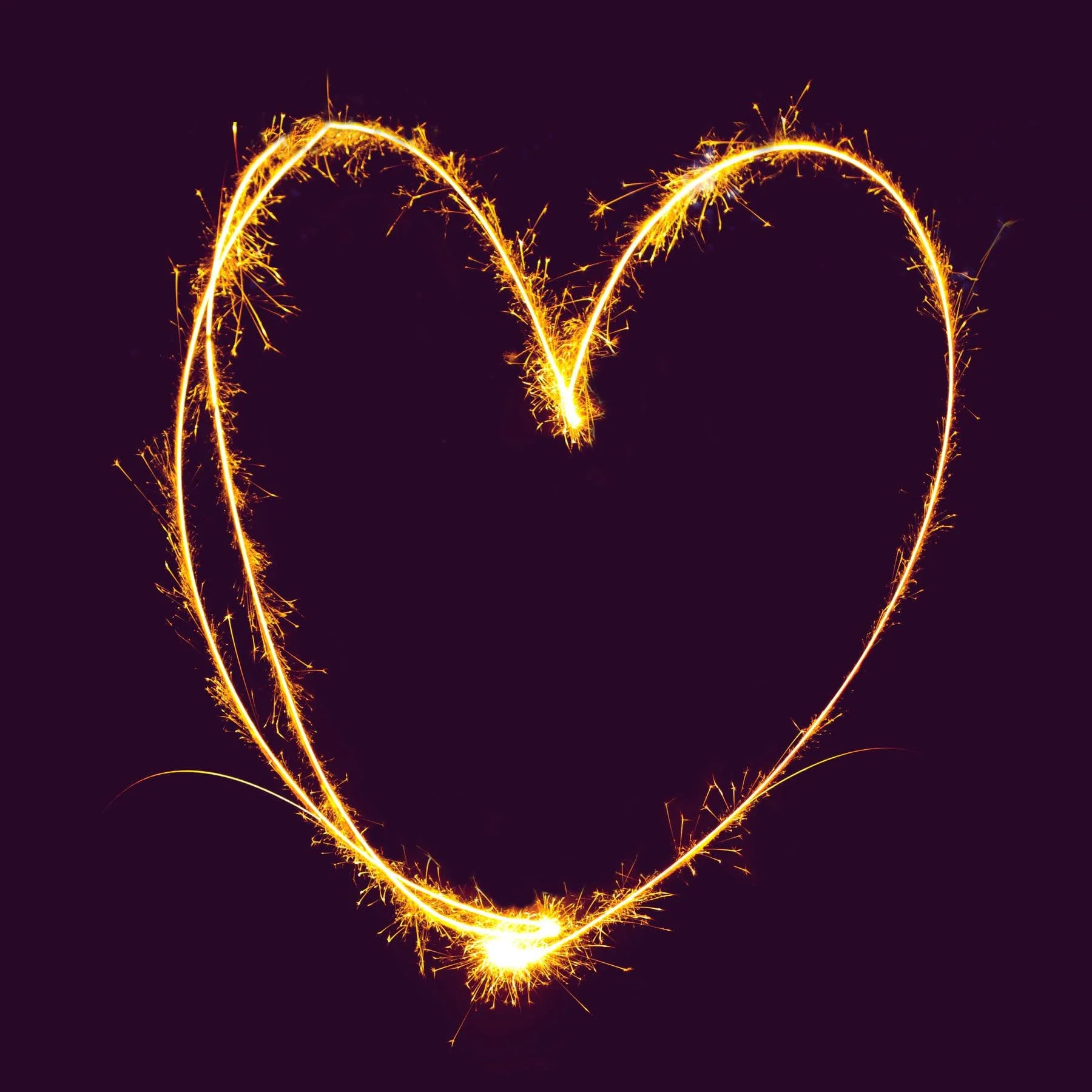 heart photography made with sparklers at night