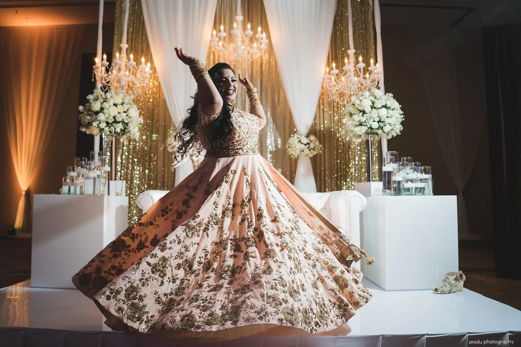  Bride twirls and spins in dress. 