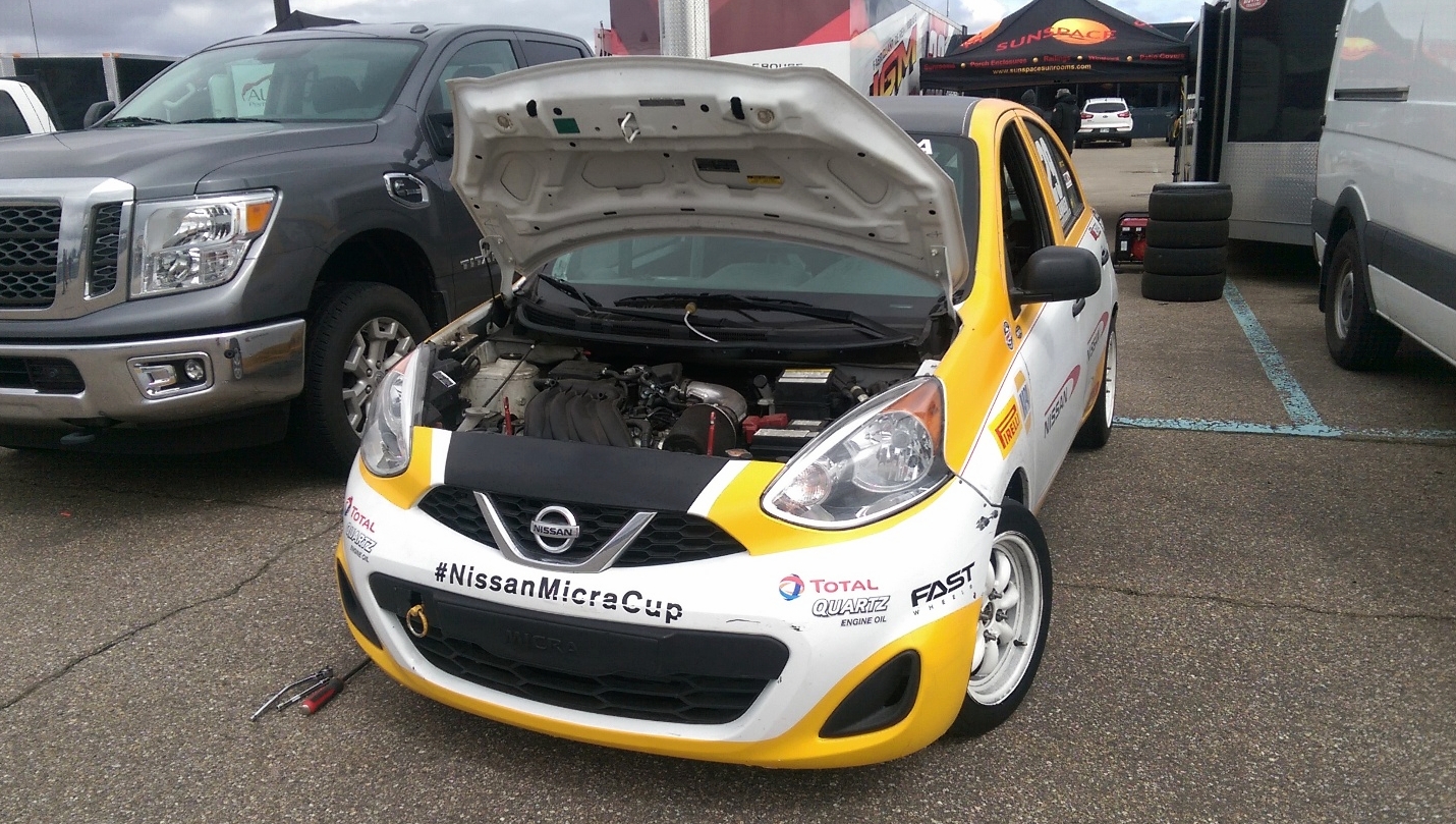 Loose isn't fast in this case. During the third session of the day I found that all but two bolts holding the intake manifold had fallen out, and the remaining two were loose. I was lucky it didn't completely fall off and cause more damage.