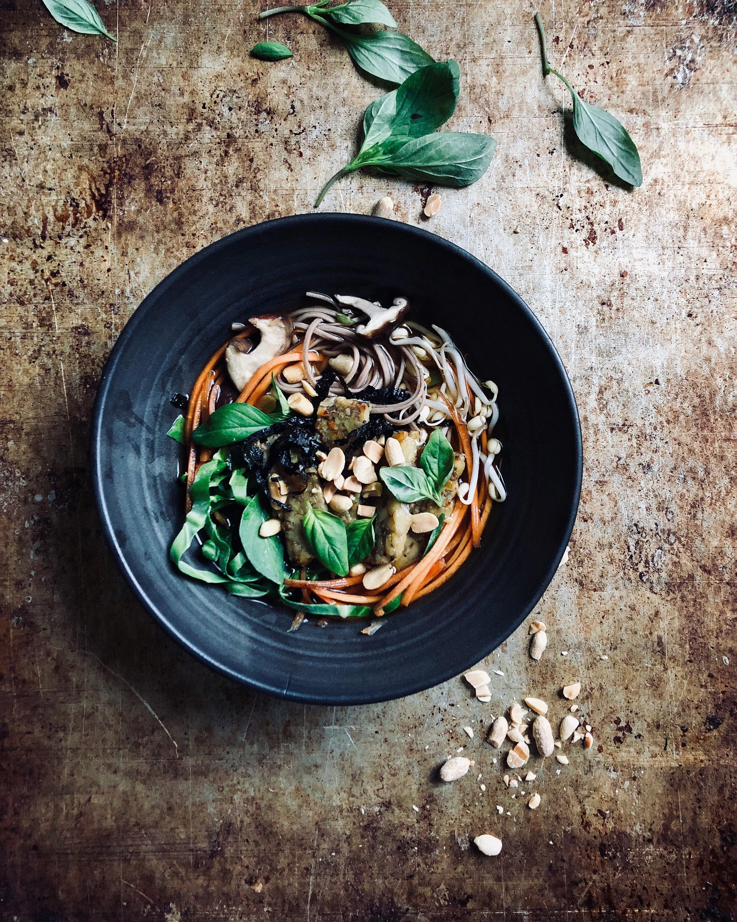 Ramen with miso broth, shiitake mushrooms, tempeh and pickled carrot