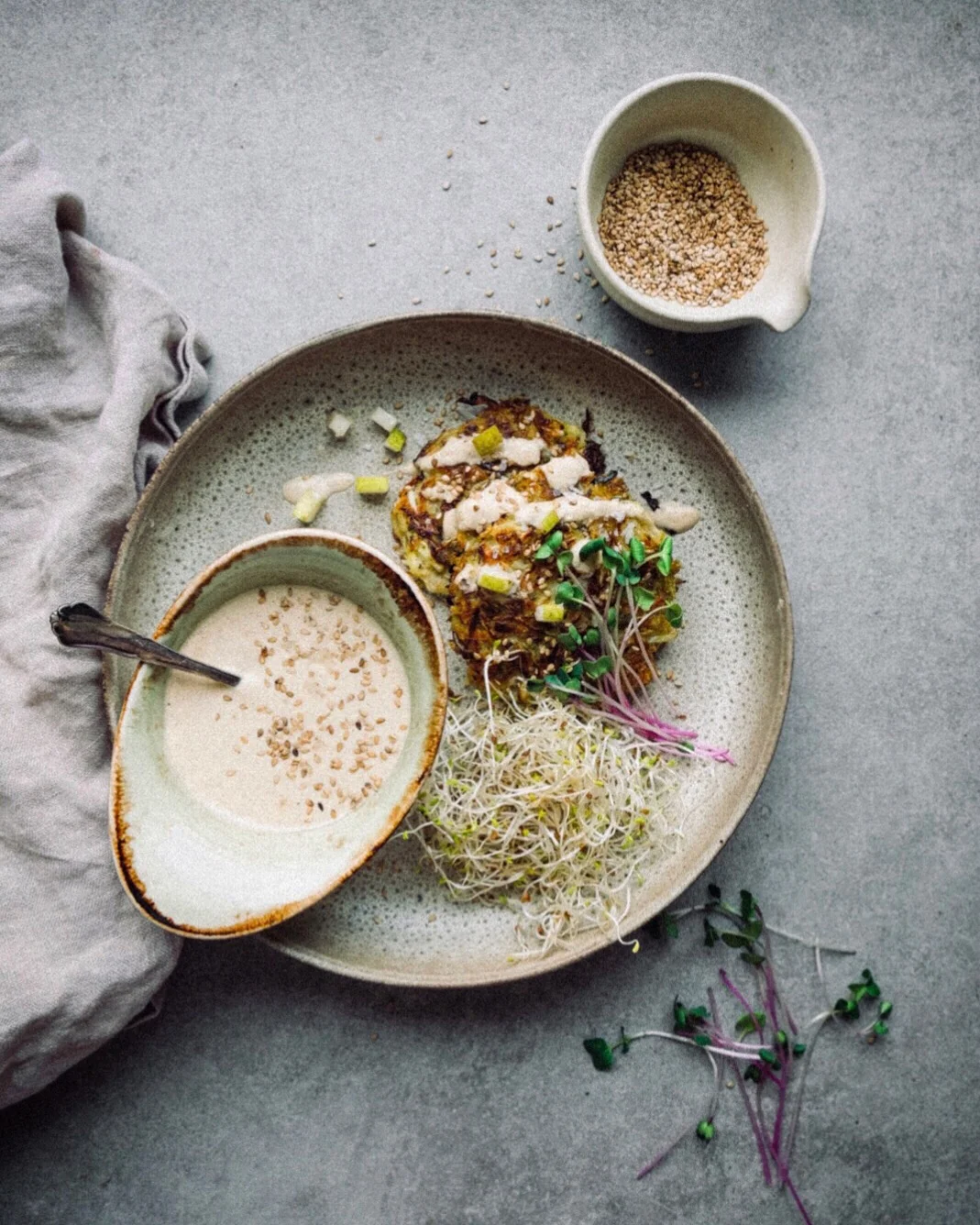 Kimchi fritters with Tahini and ginger sauce