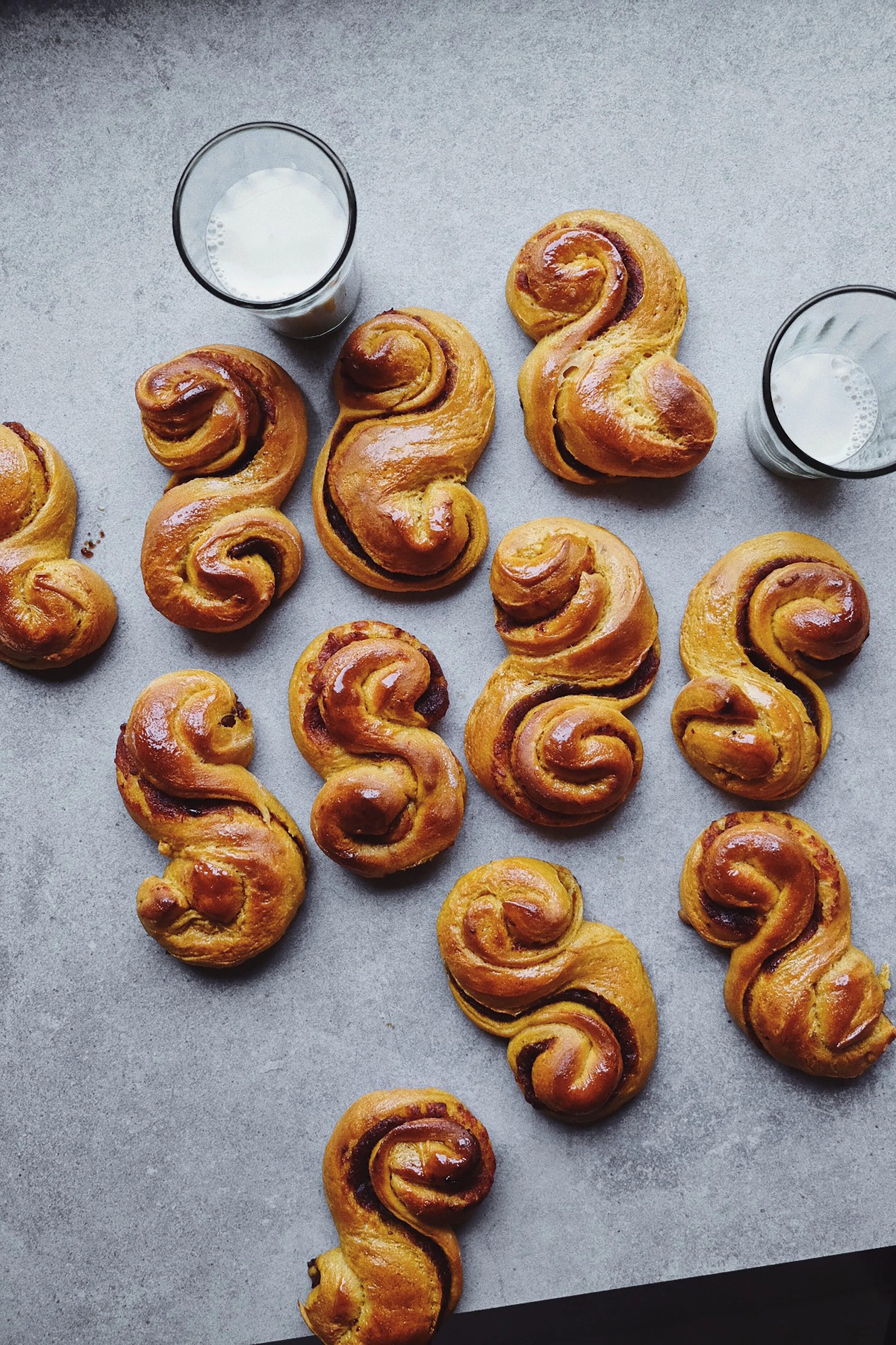 Swedish plant “lussekatter” with creamy saffron date filling