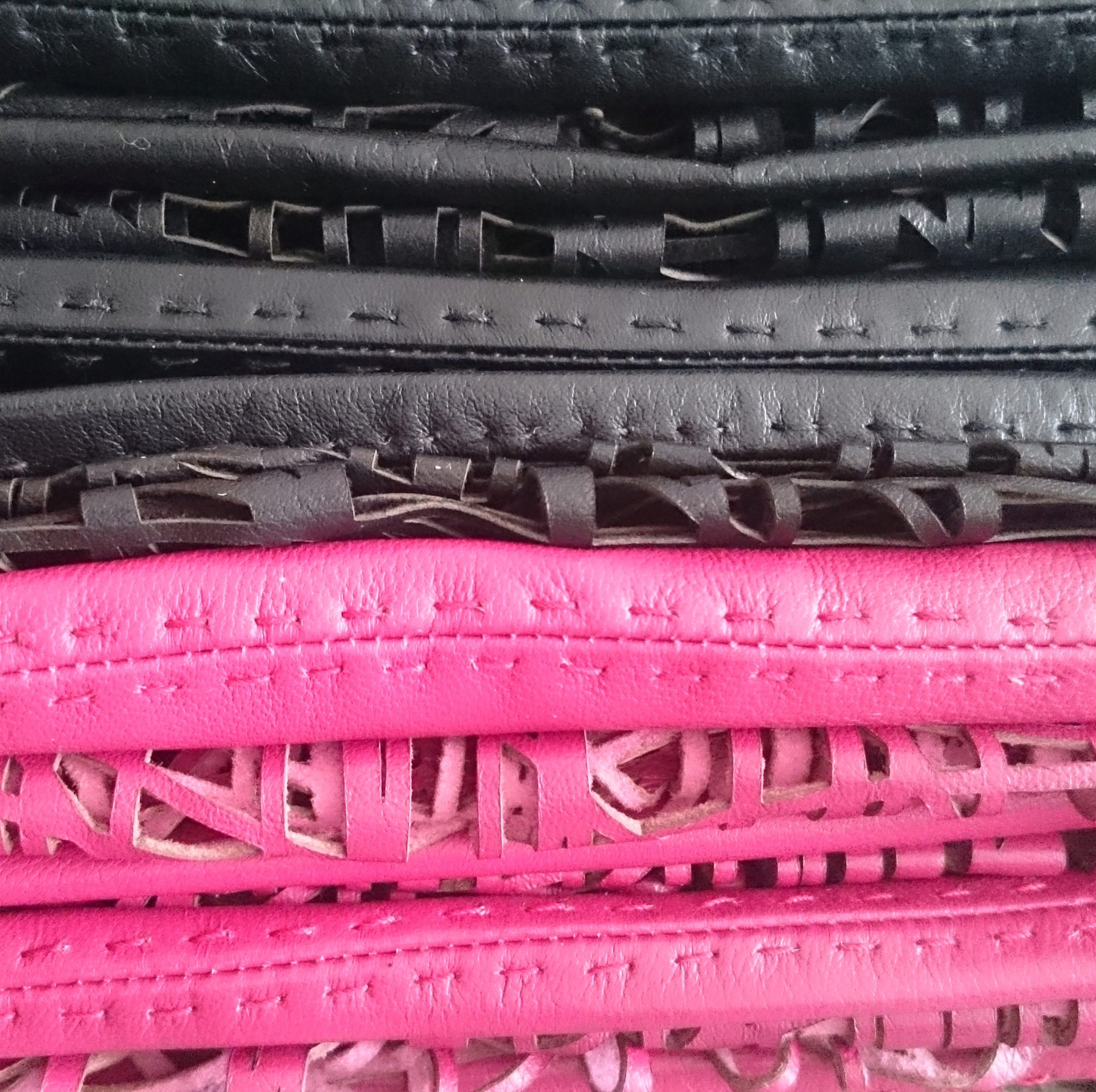 After cleaning the residue of cutting, the two halves of the scarves are stitched together and stitched through by hand.