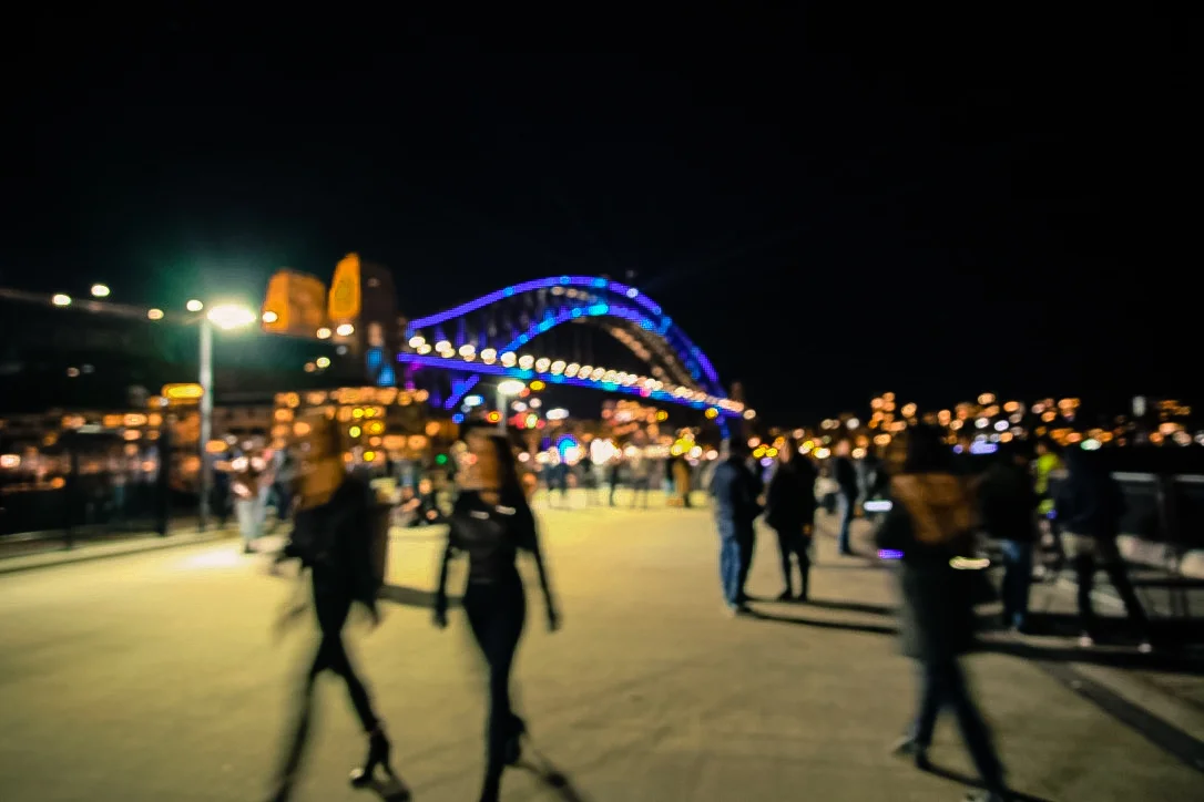 the iconic Harbour Bridge stands out against the dark night