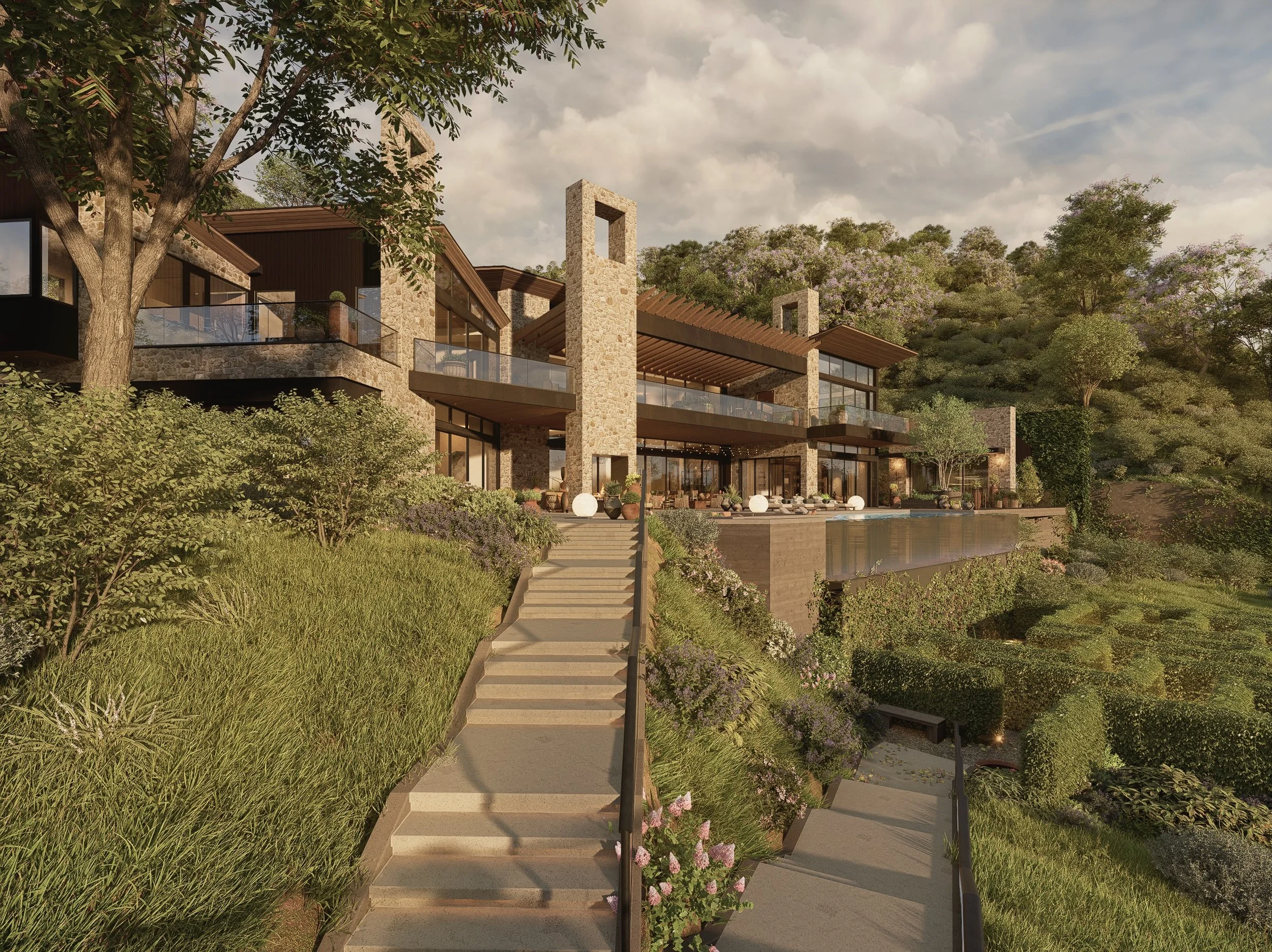A modern hillside home designed to feel at one with its surroundings. Natural stone, warm wood, steel and expansive glass create a seamless connection between the architecture, interiors and landscape.

Designed by Welch Design Studio Architecture + 