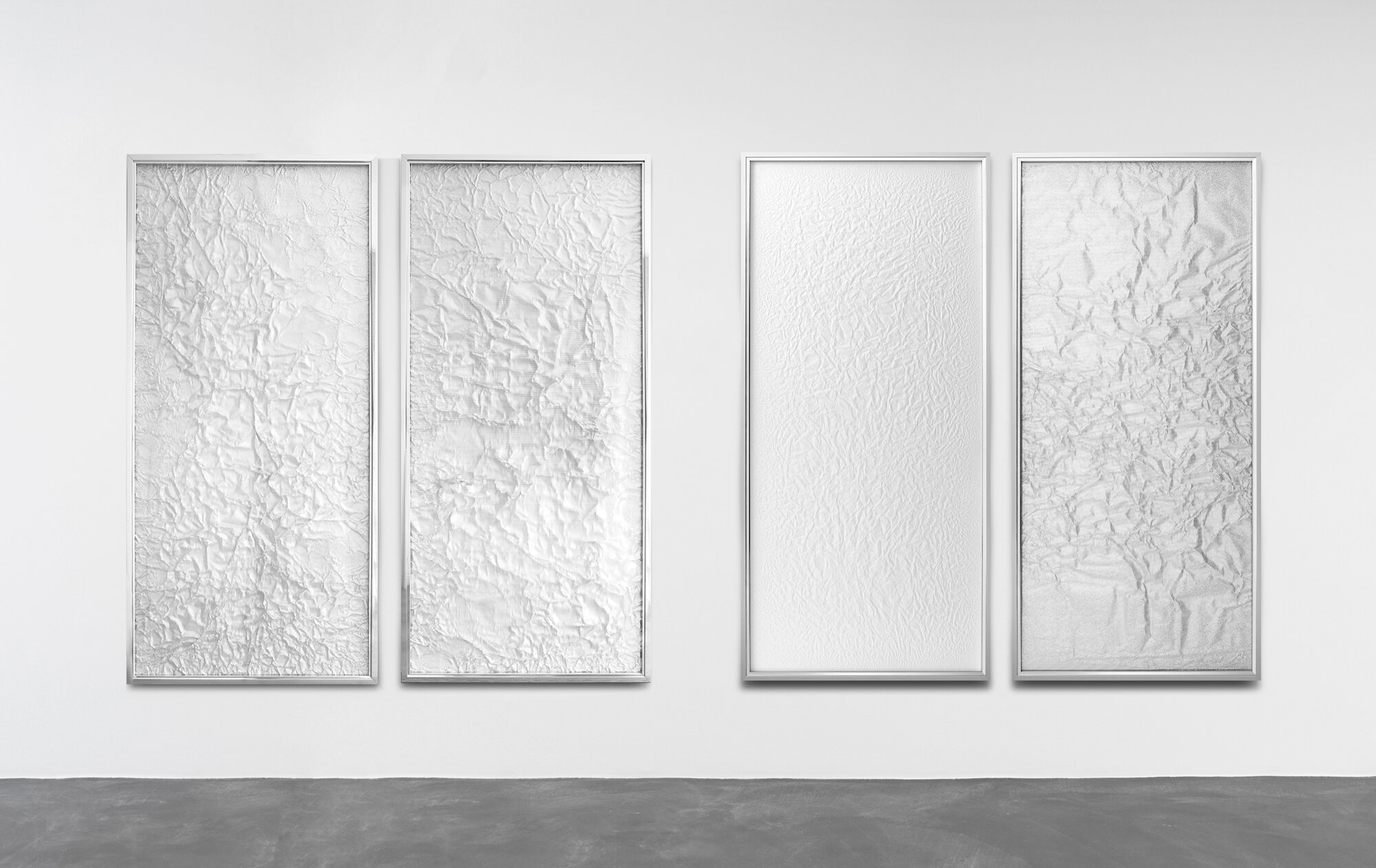 Tabula Rasa / Part I, II, IV, V, 2016 / 2017 - Installation view Industrial aluminium beneath structured Plexiglas, aluminium frame, Mulberry Hanji paper on wood beneath structured Plexiglas, aluminium frame 152 x 72 cm (60 x 28 in) each