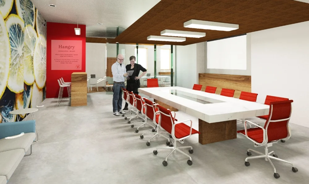 the office conference room with a custom conference table designed from reclaimed wood and marble.
