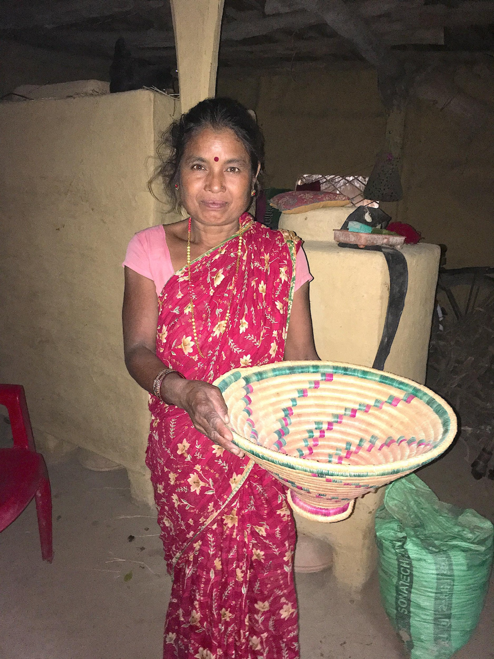 Dhankumari with her hand woven basket
